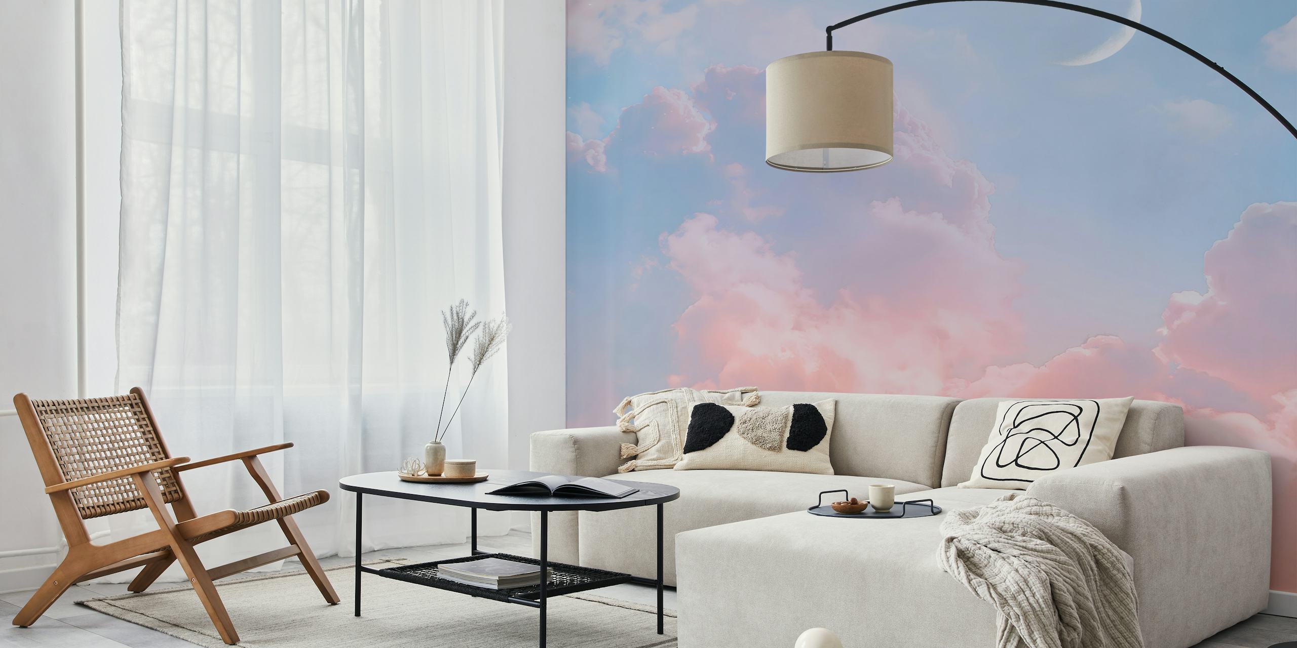 Cloudy pastel sky with pink and blue hues and crescent moon wallpaper