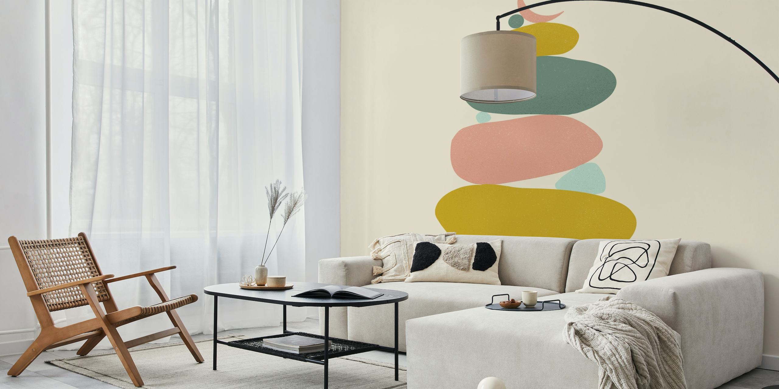 Illustrative wall mural of stacked stones in pastel colors, conveying a sense of calm and balance.