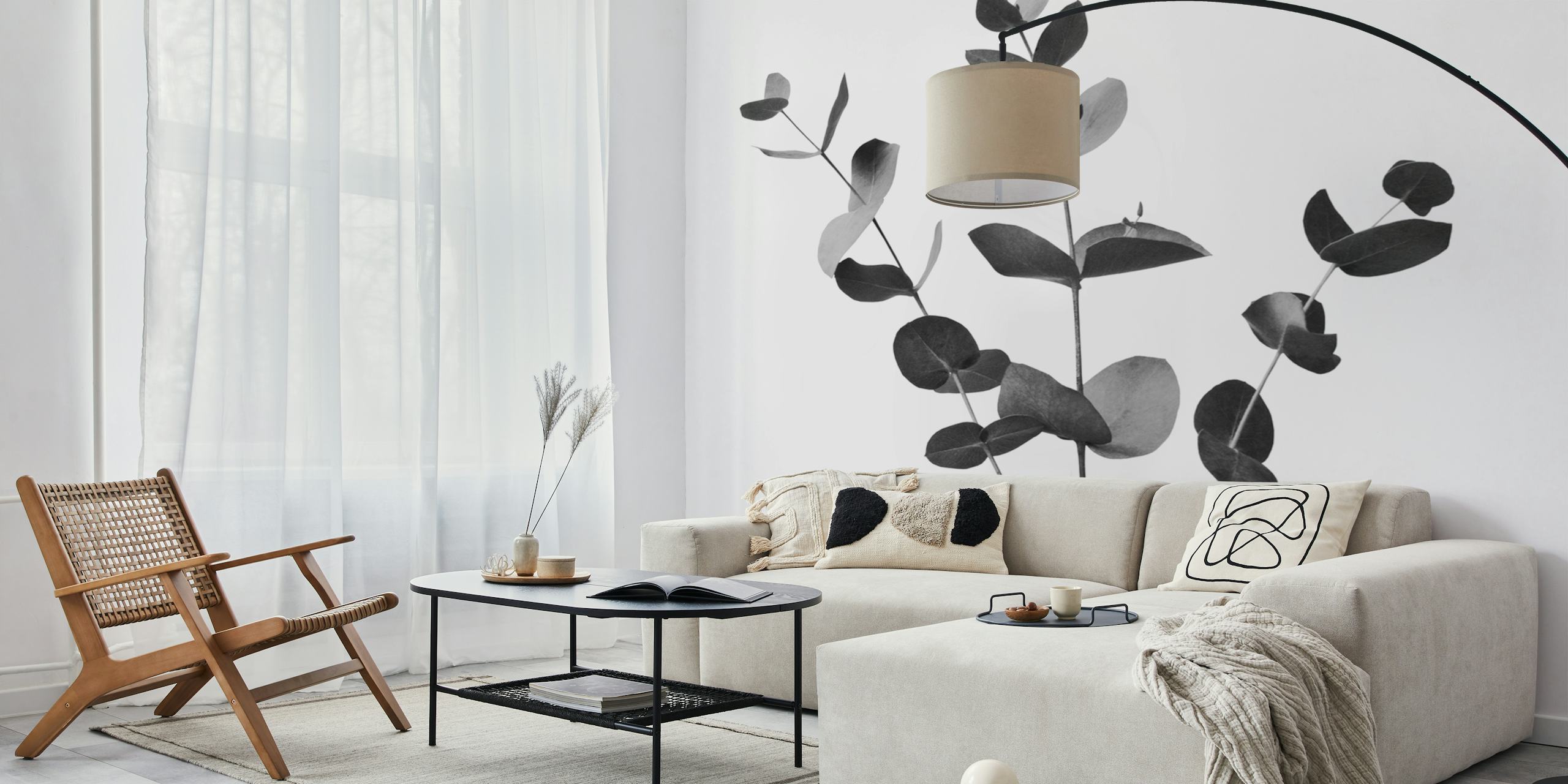Black and white wall mural of eucalyptus branches for a serene interior.
