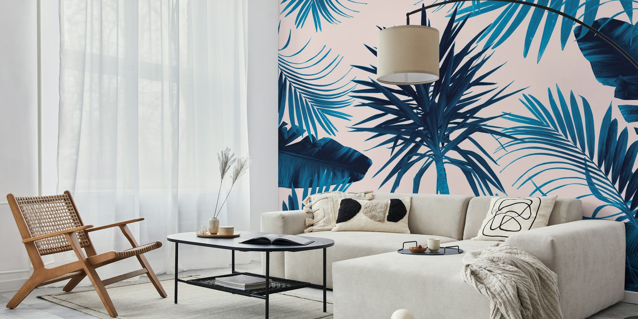 Tropical palm leaves in blue against a pink background wallpaper