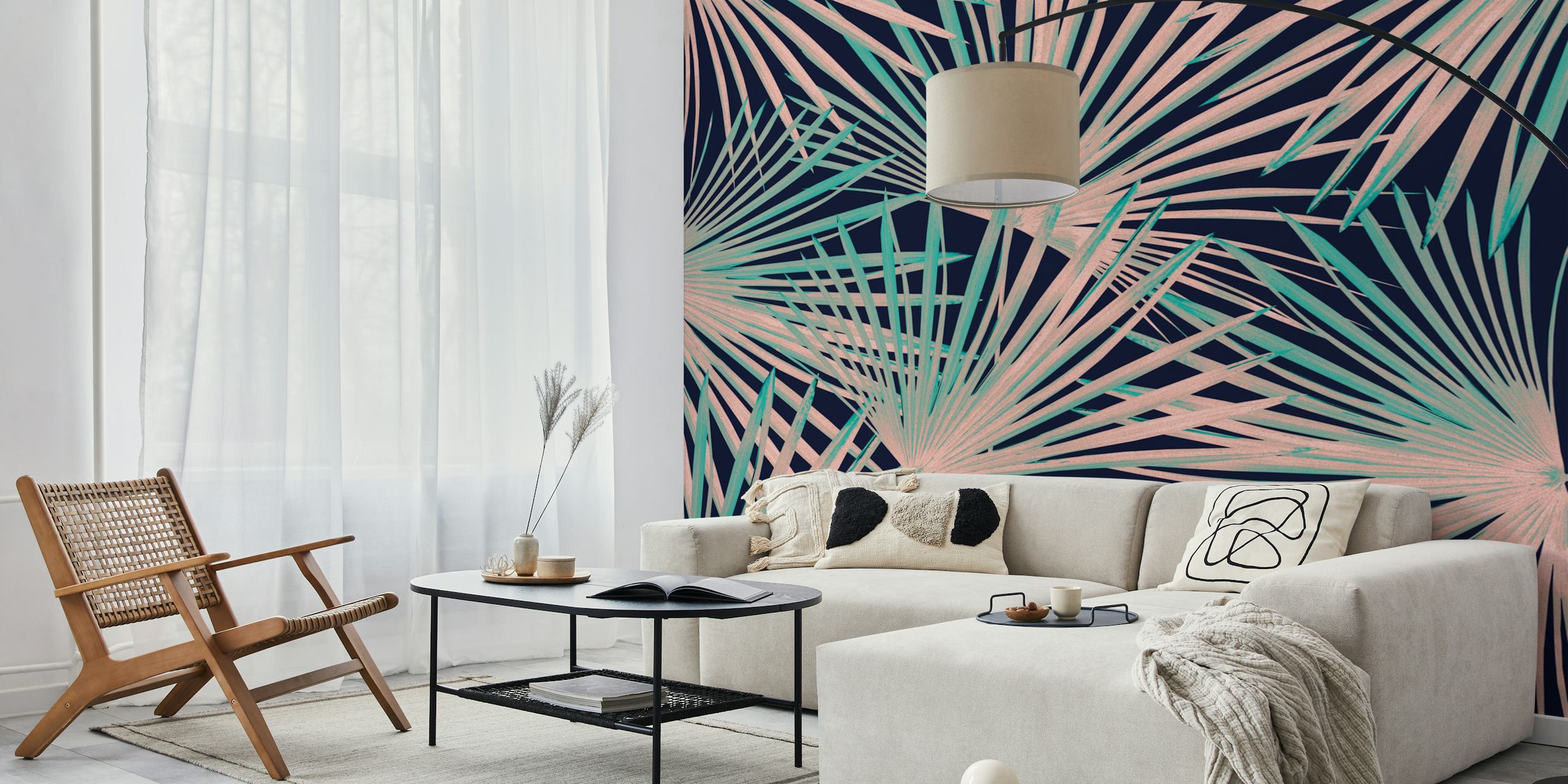 Tropical fan palm leaves in green and pink on a dark background wallpaper