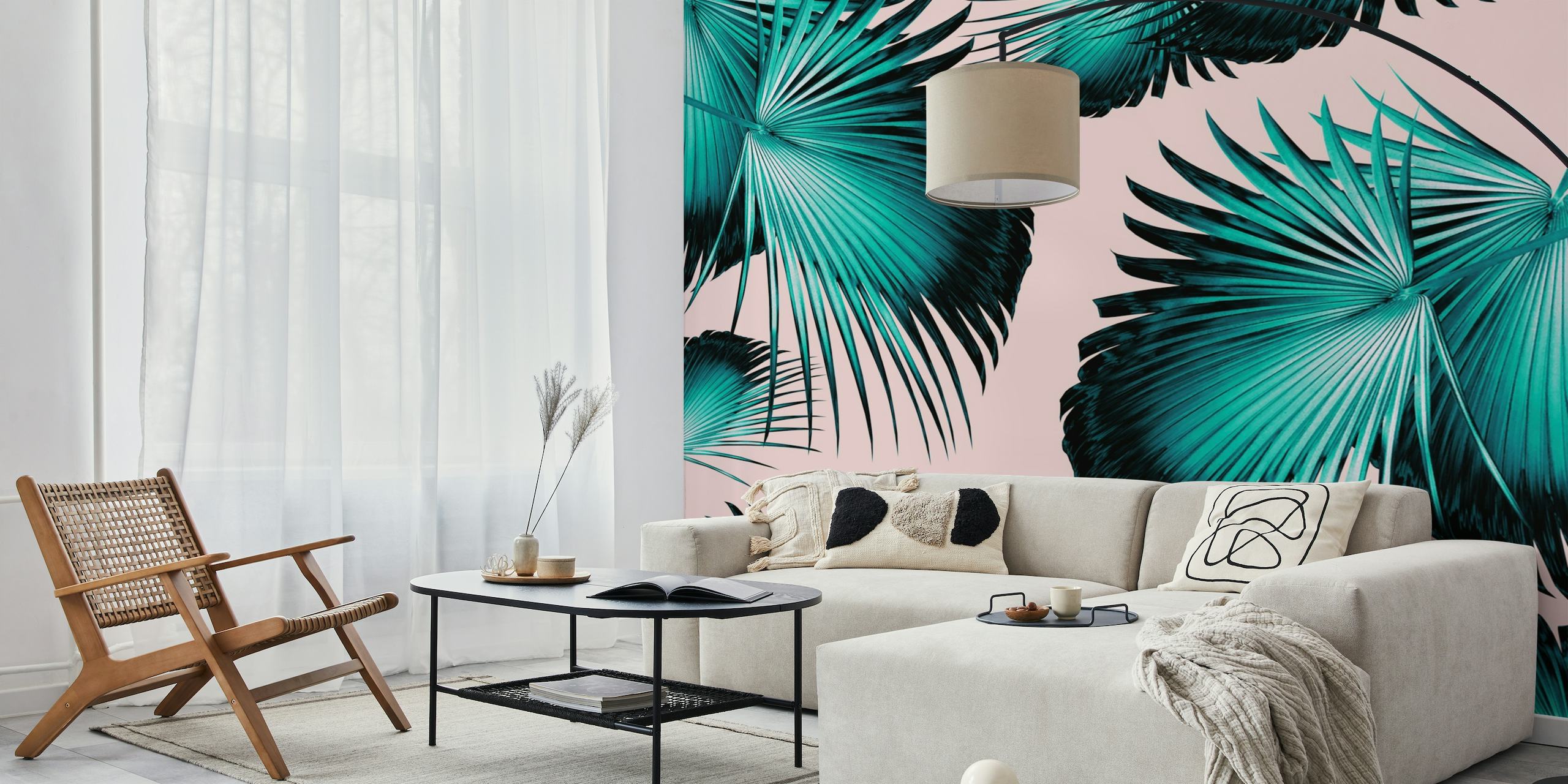 Fan palm leaves on pink background wall mural