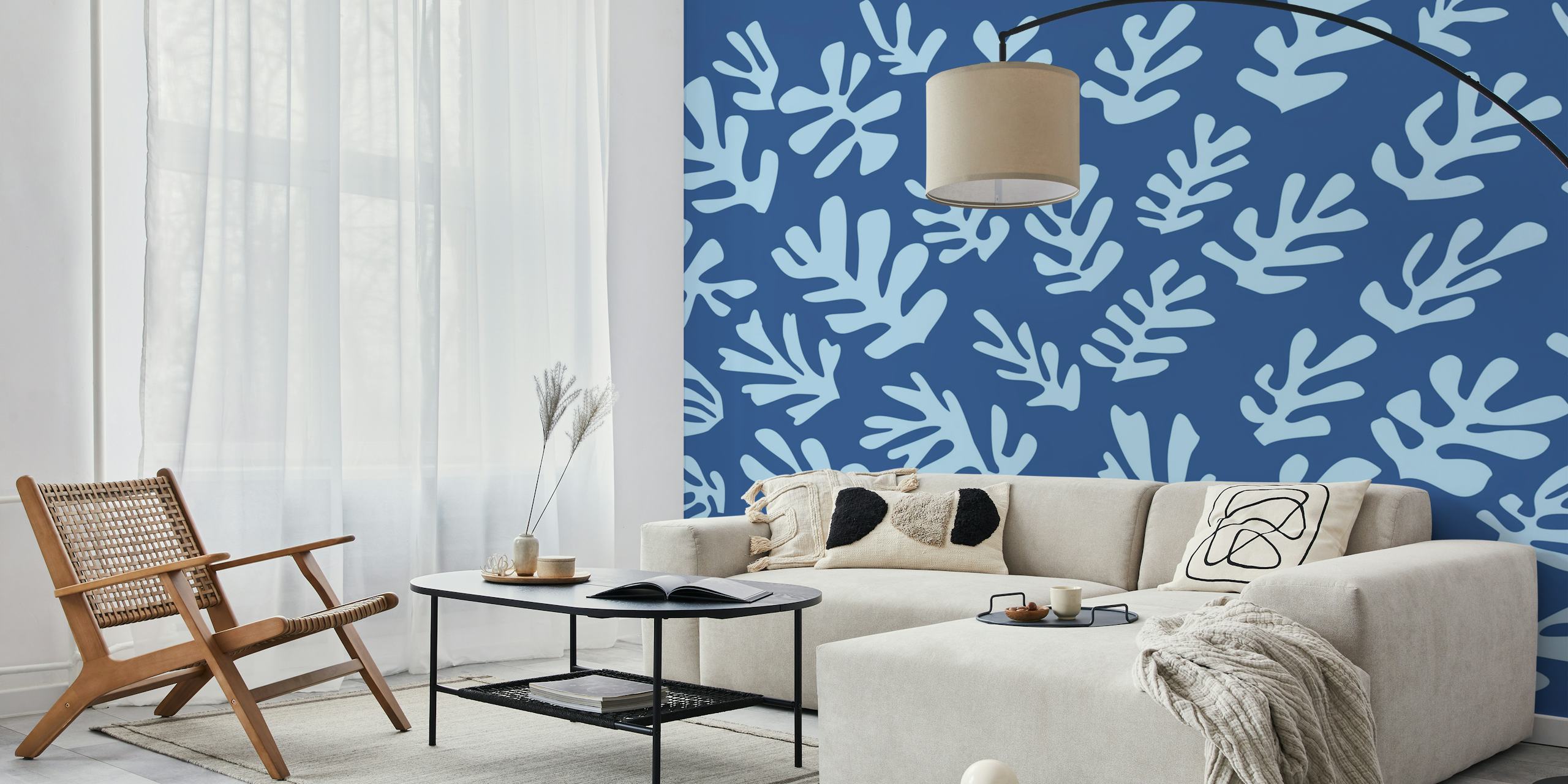Aqua blue leaves against a dark blue background wallpaper