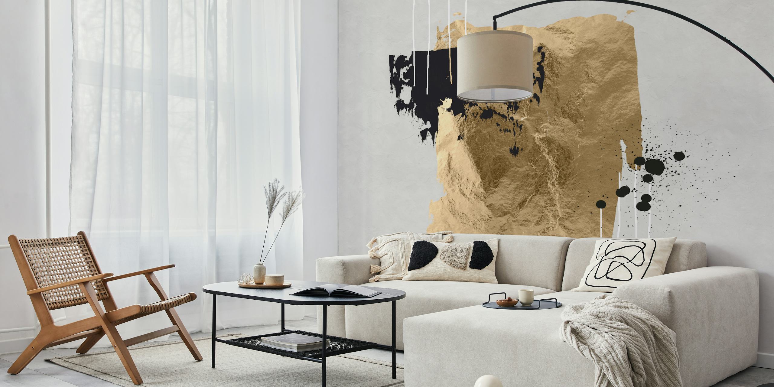 Abstract brush strokes in gold and black on light wallpaper
