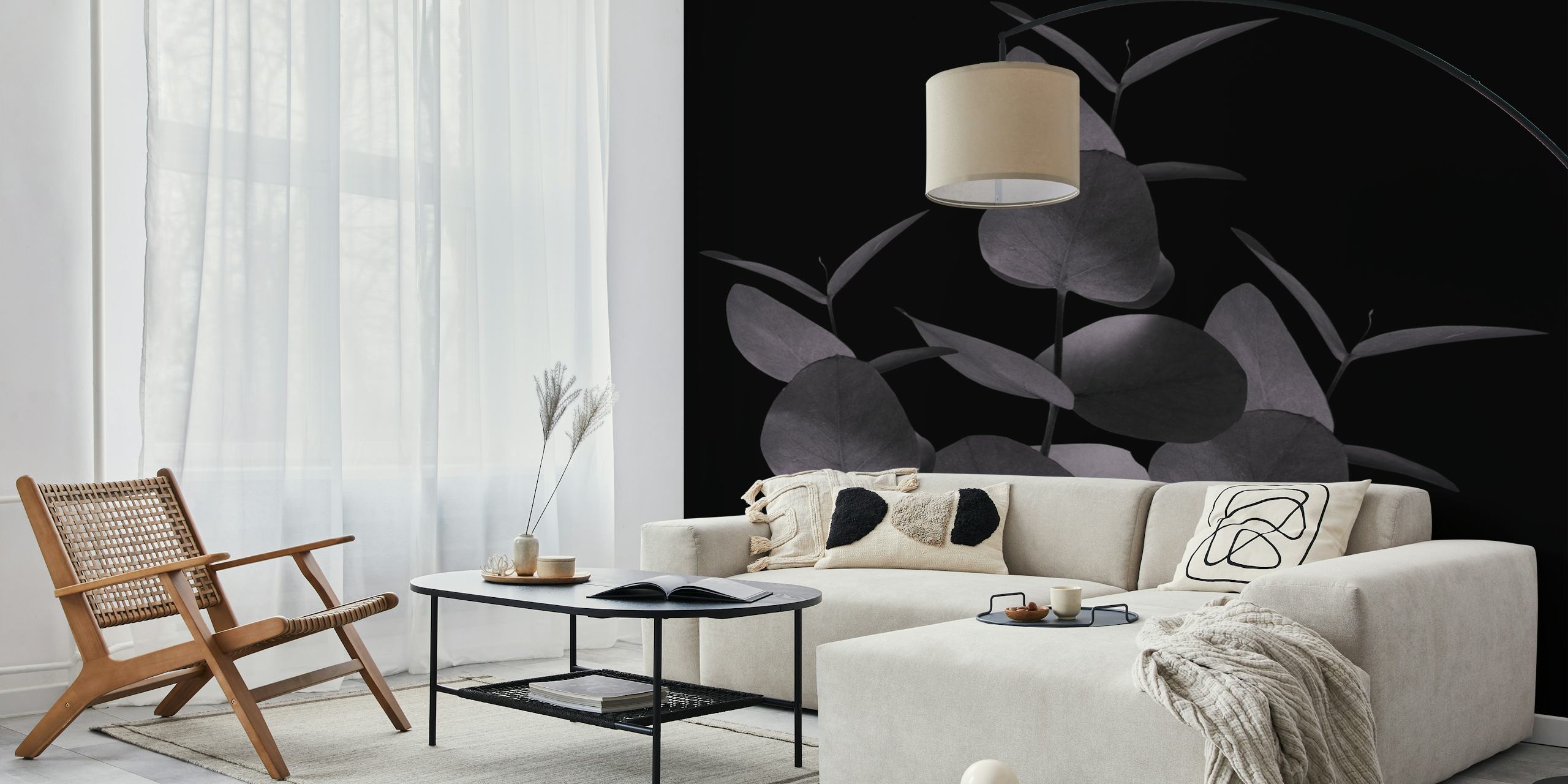 Eucalyptus leaves against a black background wallpaper