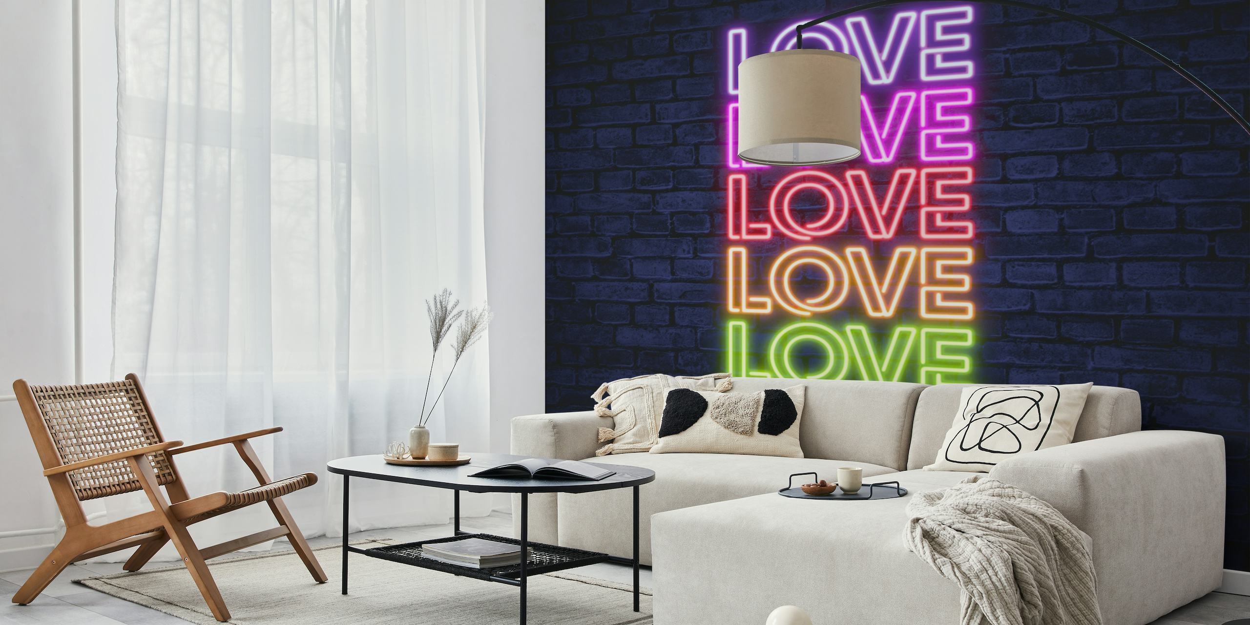 Neonová typografie lásky v růžové, modré a žluté na zdi na pozadí nástěnné malby
