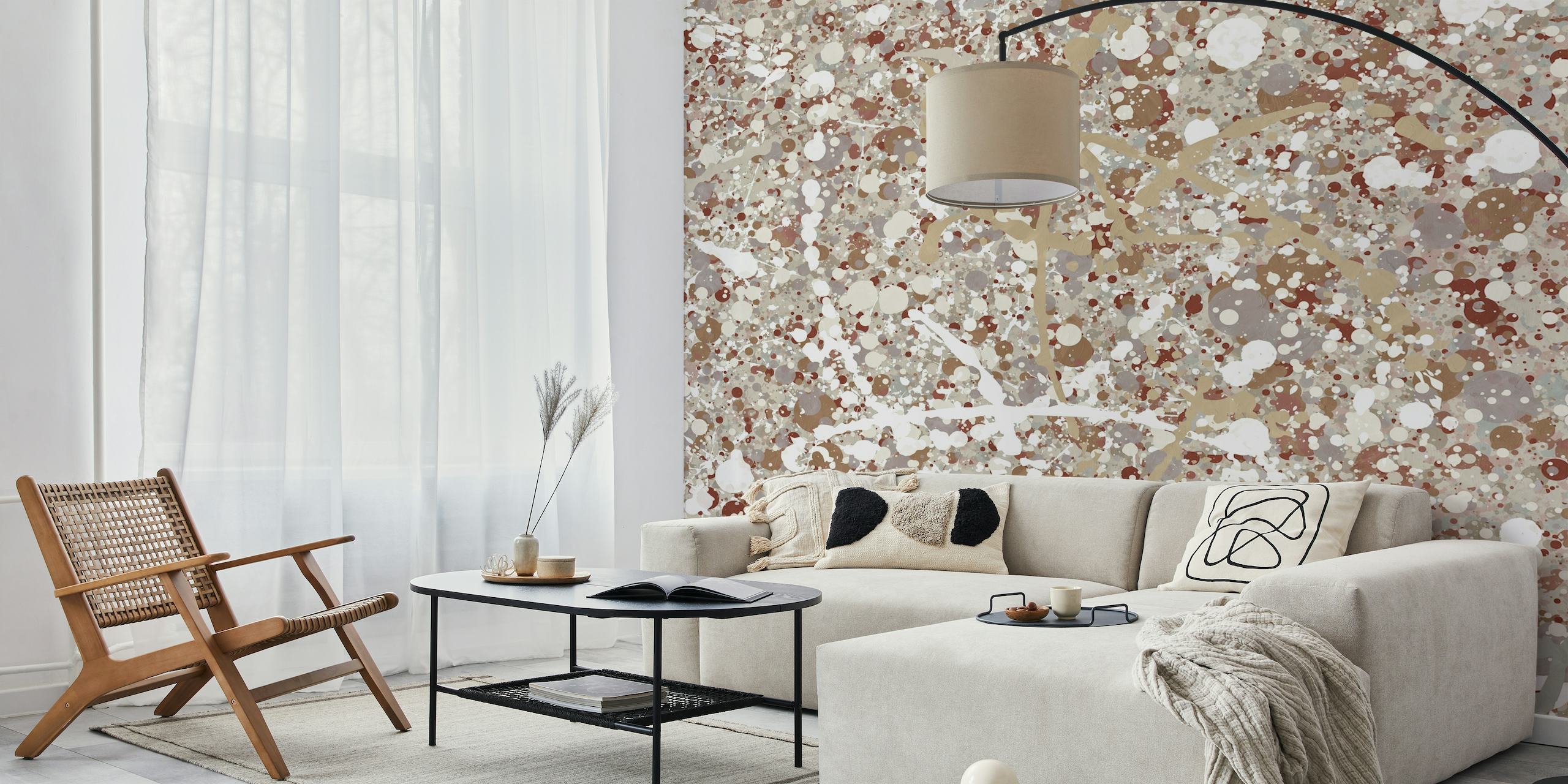Abstract expressionist style wall mural with splashes of paint in neutral tones.