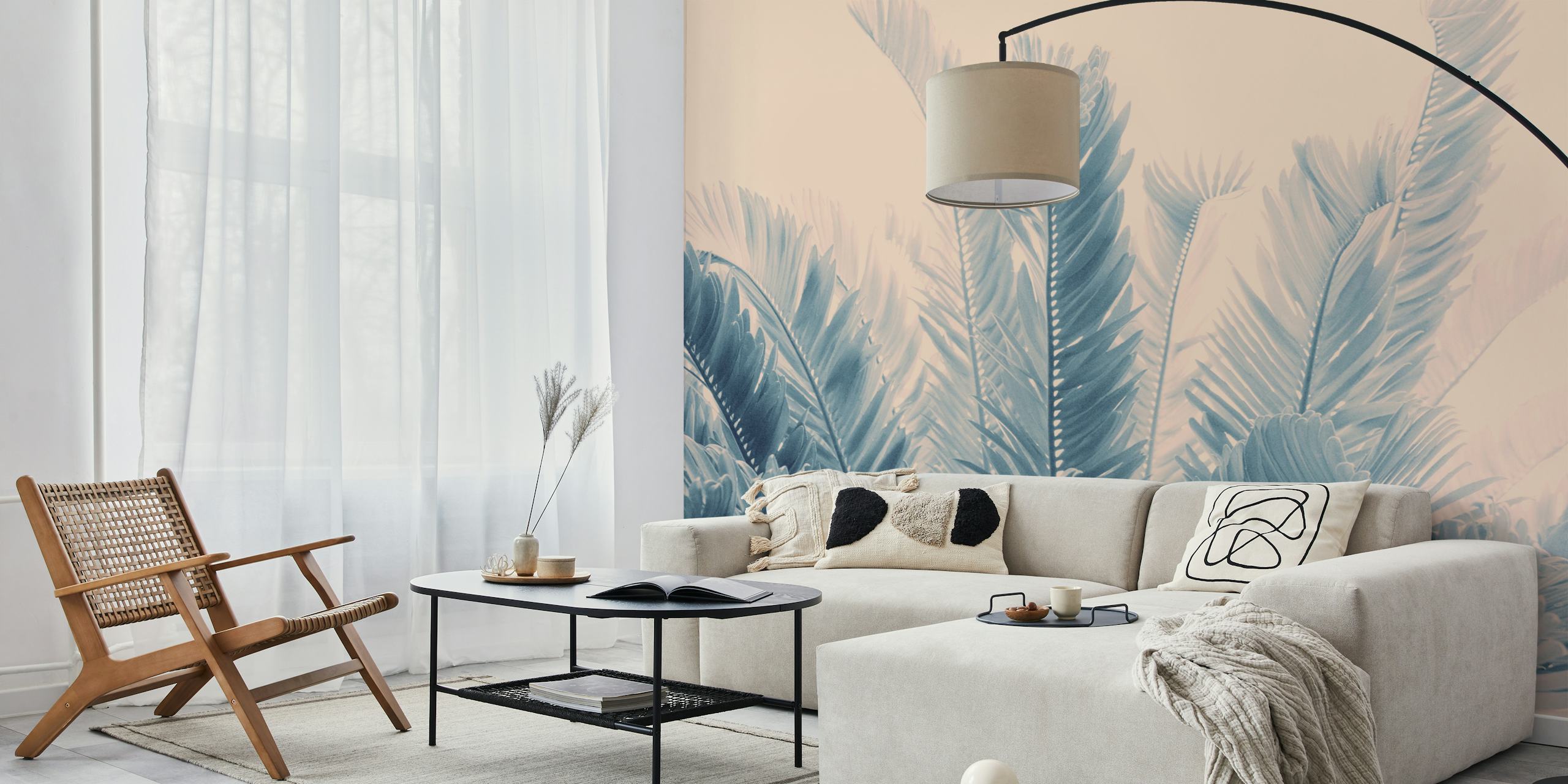 Tropical leaves wallpaper in soft blue tones