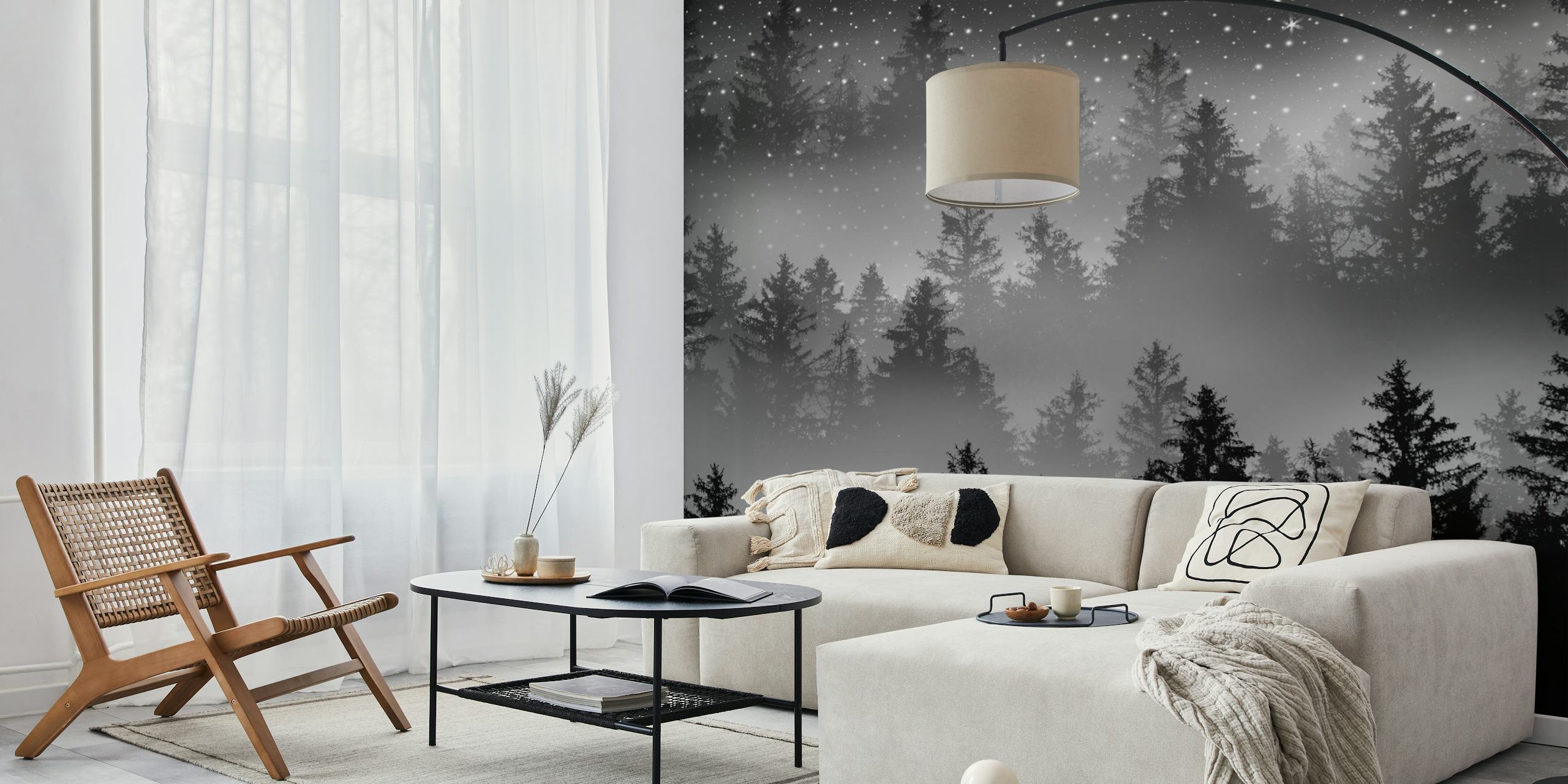 Black and white wall mural depicting a forest under a starry night sky