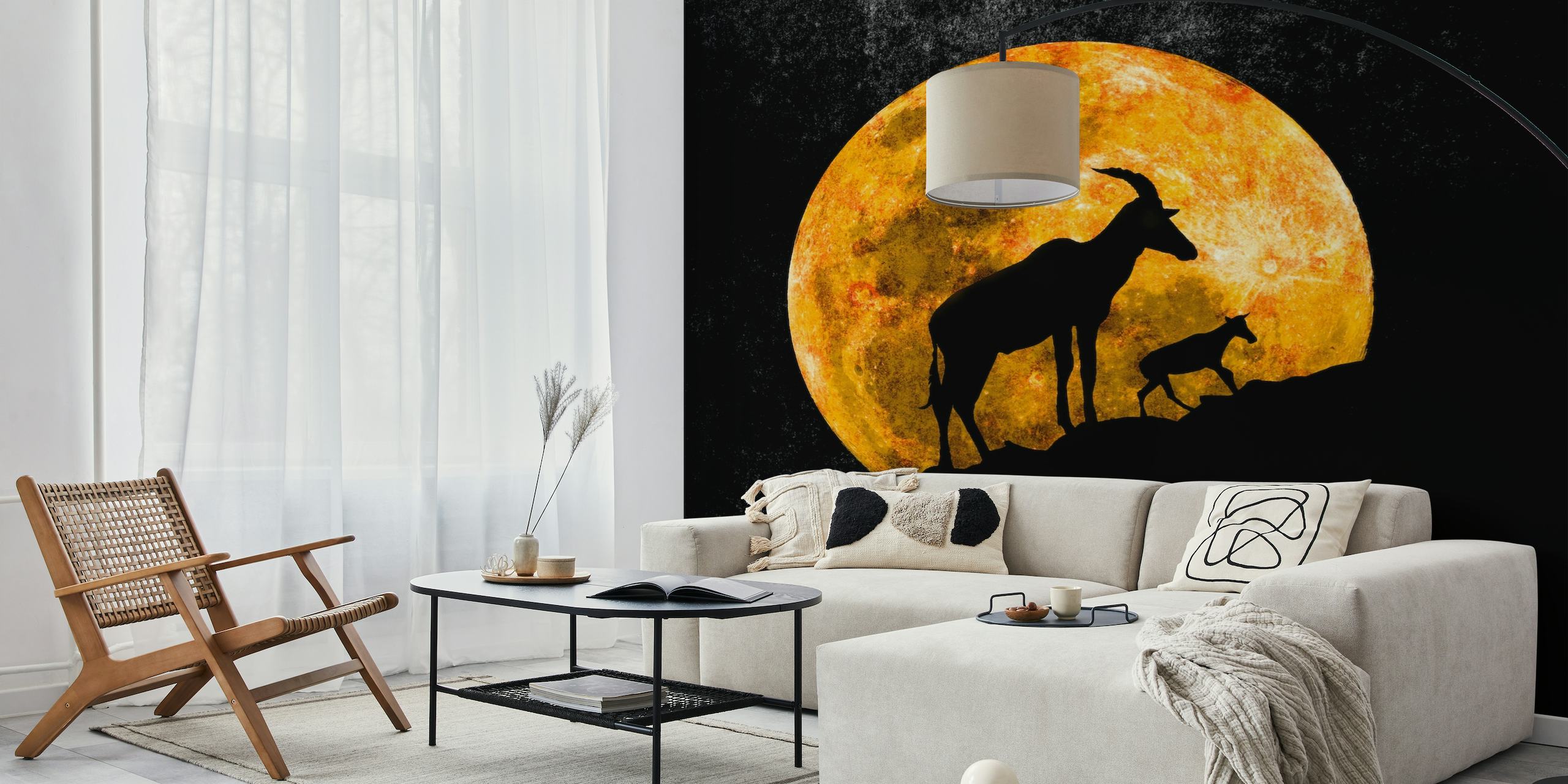 Topi antelope silhouette with calf against full moon on wall mural