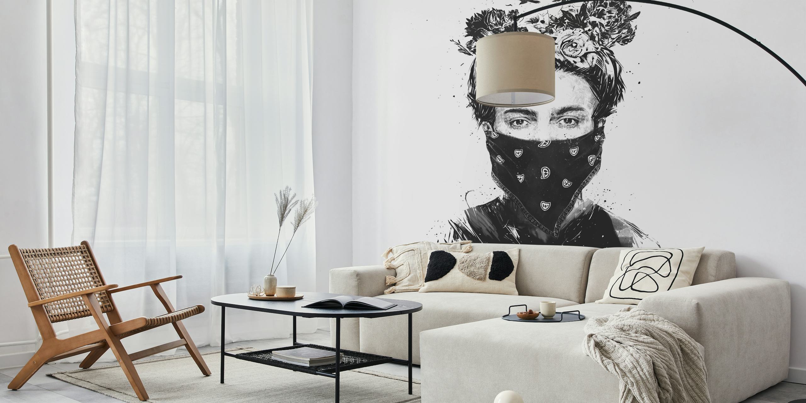 Black and white wall mural of a girl with a flower crown and a patterned scarf over her face