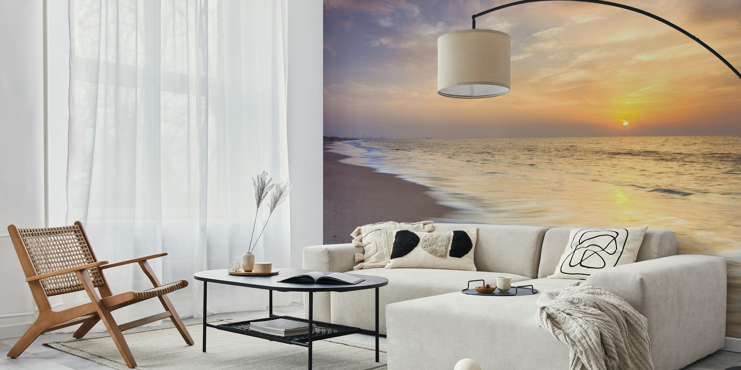 Beach sunset with waves on the shore, soft orange and blue hues, landscape wallpaper