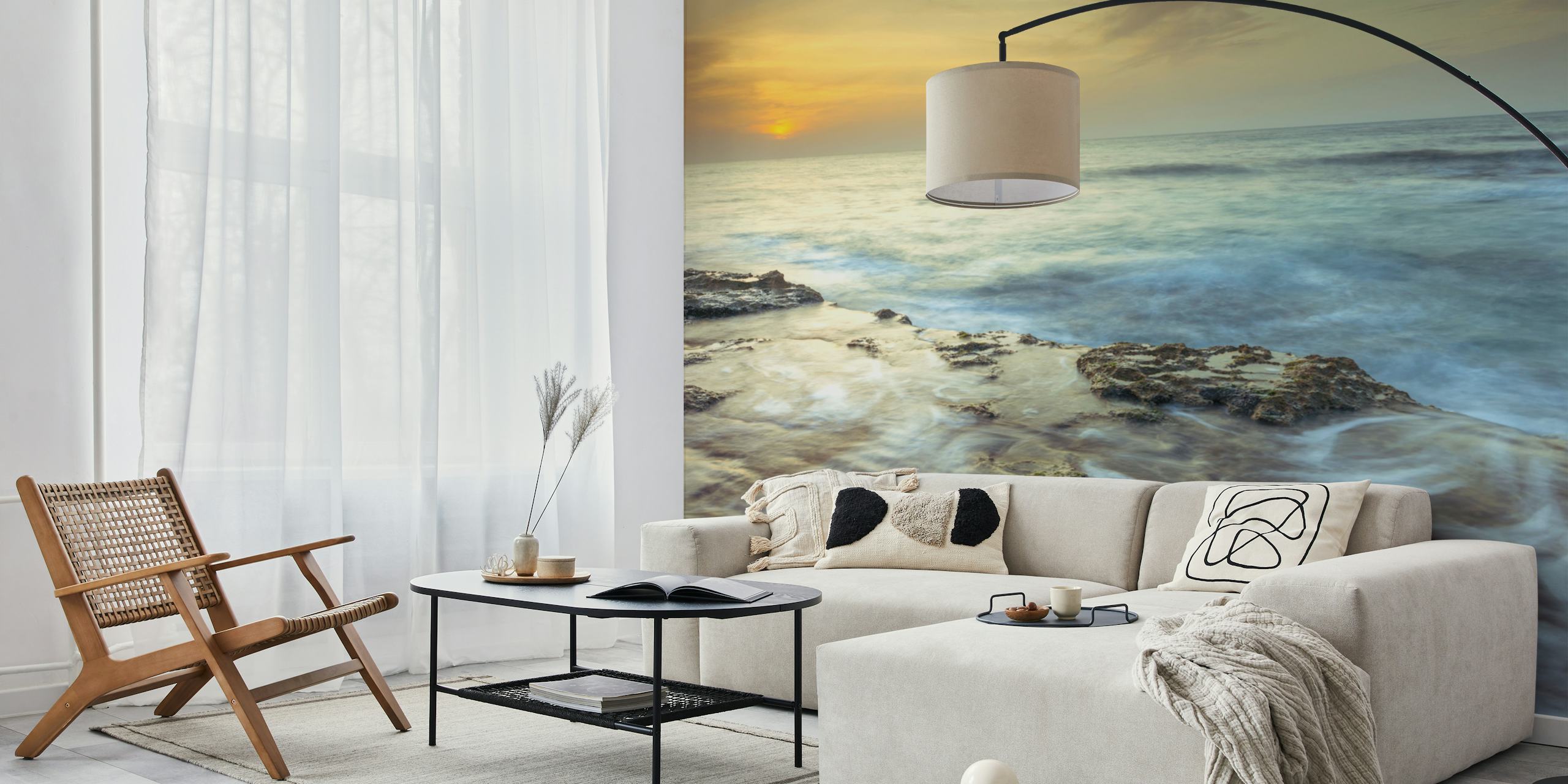 Ocean sunset with waves crashing on rocky shore wallpaper