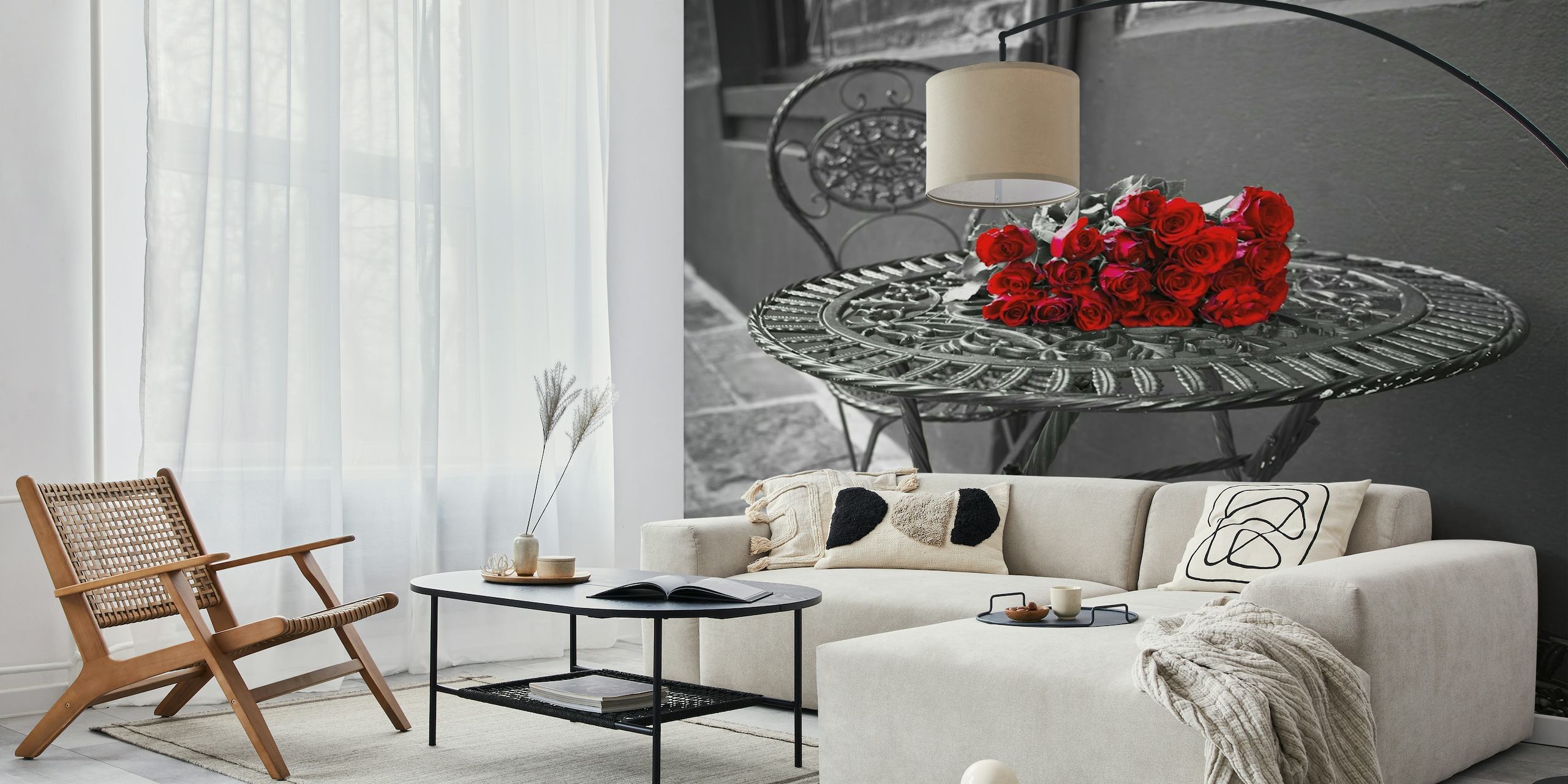 Red roses on wrought-iron table against black and white background wall mural