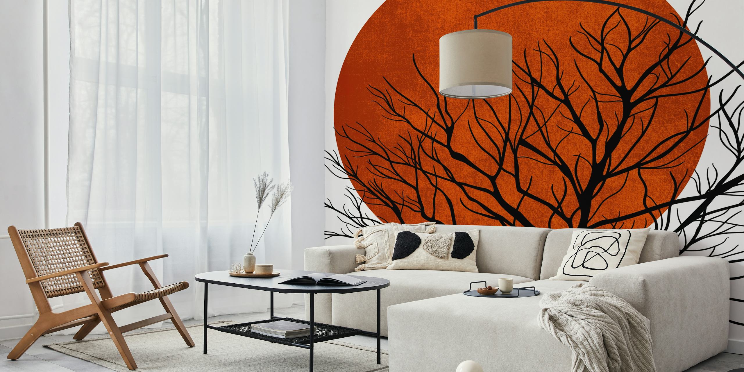 Carta da parati raffigurante la silhouette di un albero spoglio sullo sfondo di un tramonto invernale arancione