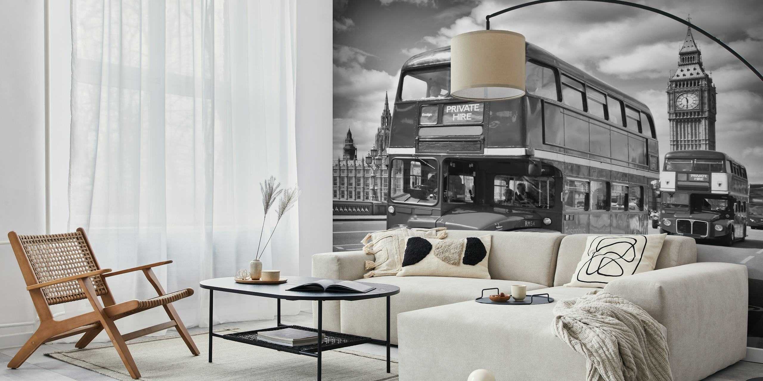 Black and white London street scene featuring iconic double-decker buses and Big Ben