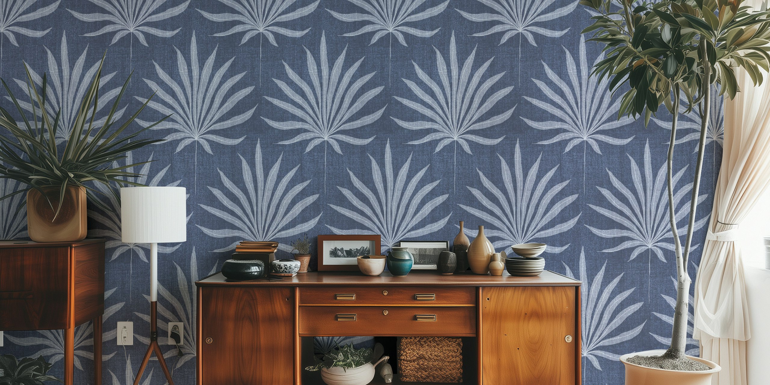 Denim blue palm frond wallpaper in a room