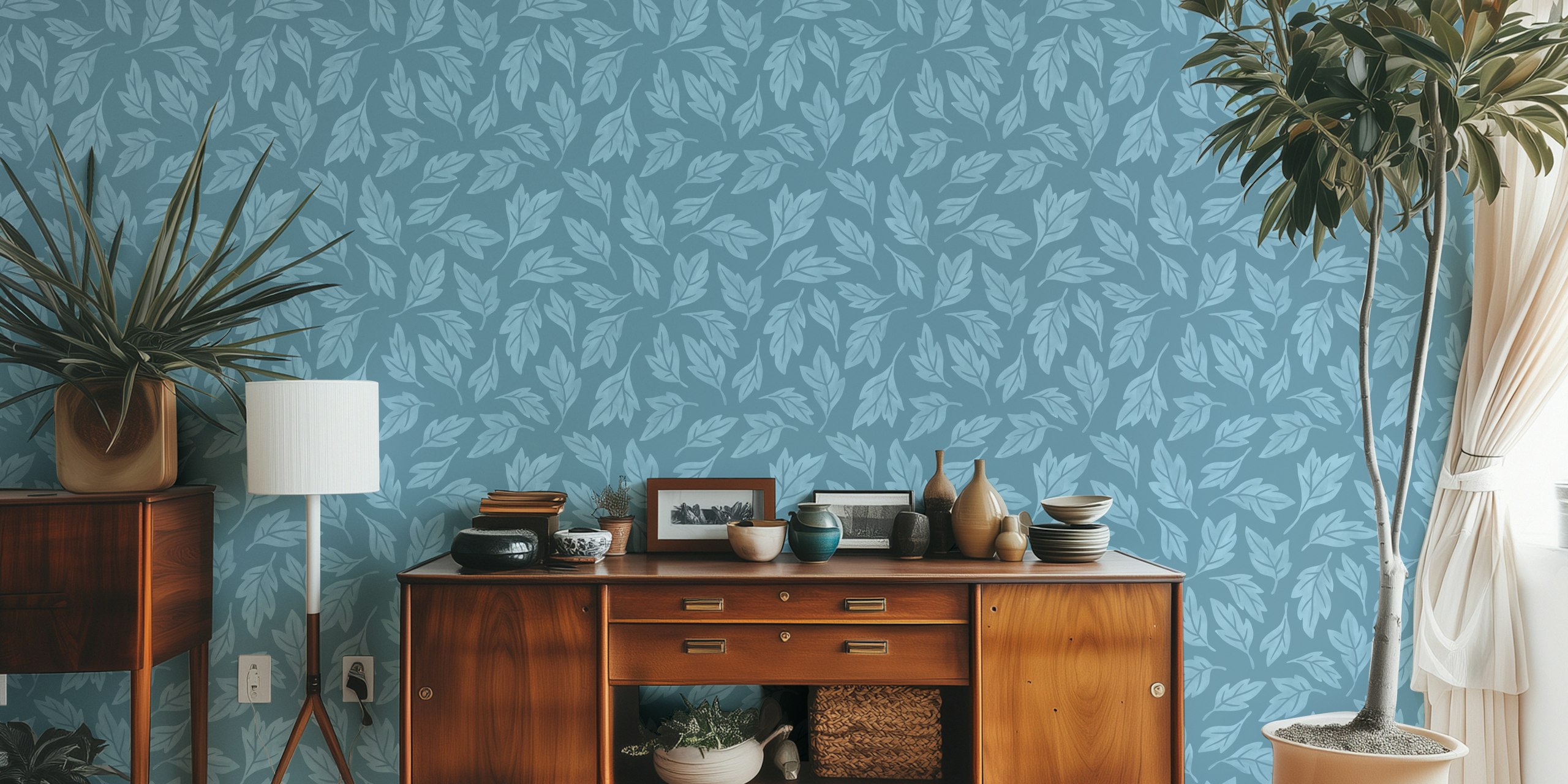 Blue leaves on a soft blue background wallpaper