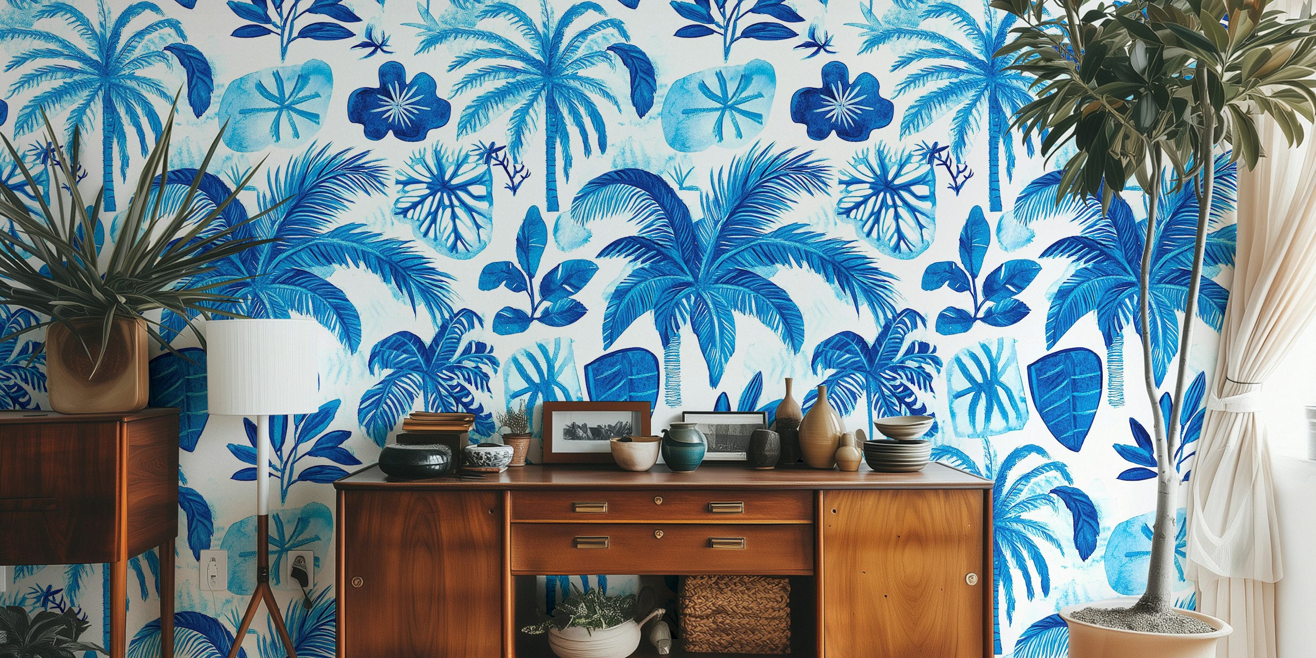 Palm leaves and tropical foliage in shades of blue wallpaper