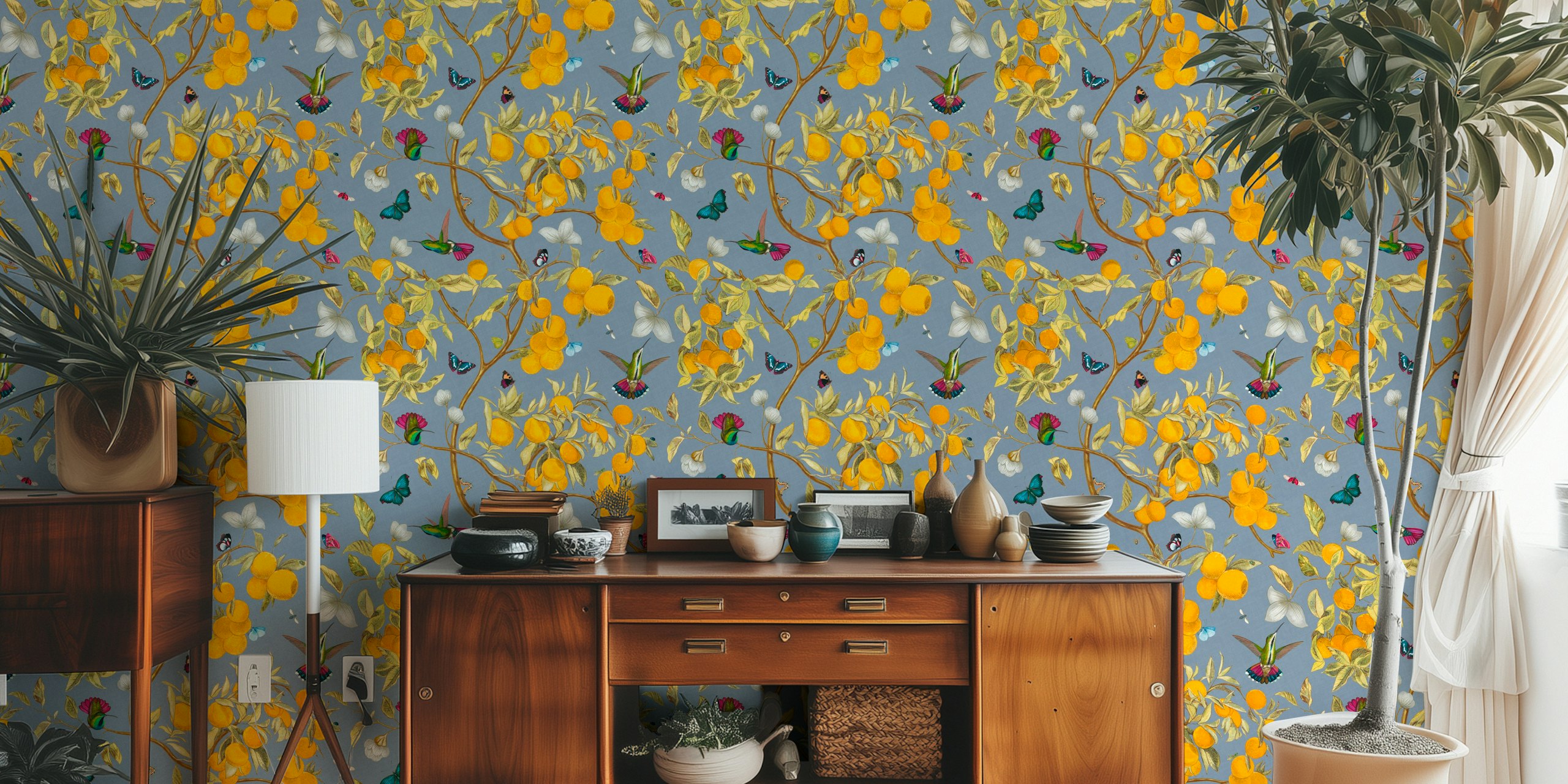 Hummingbirds, lemons, and butterflies on blue background wallpaper