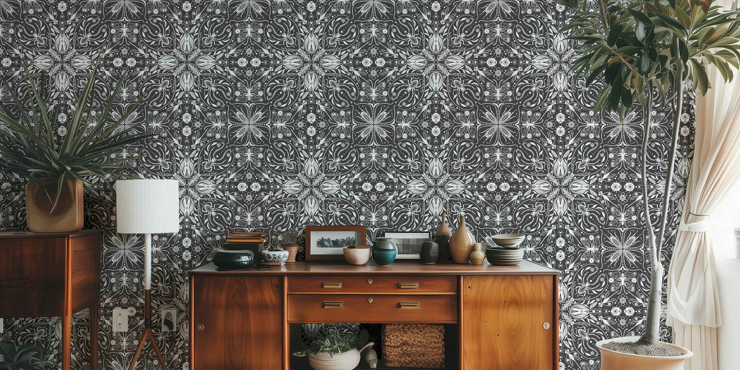Symmetrical black and white wall mural with insect and floral pattern