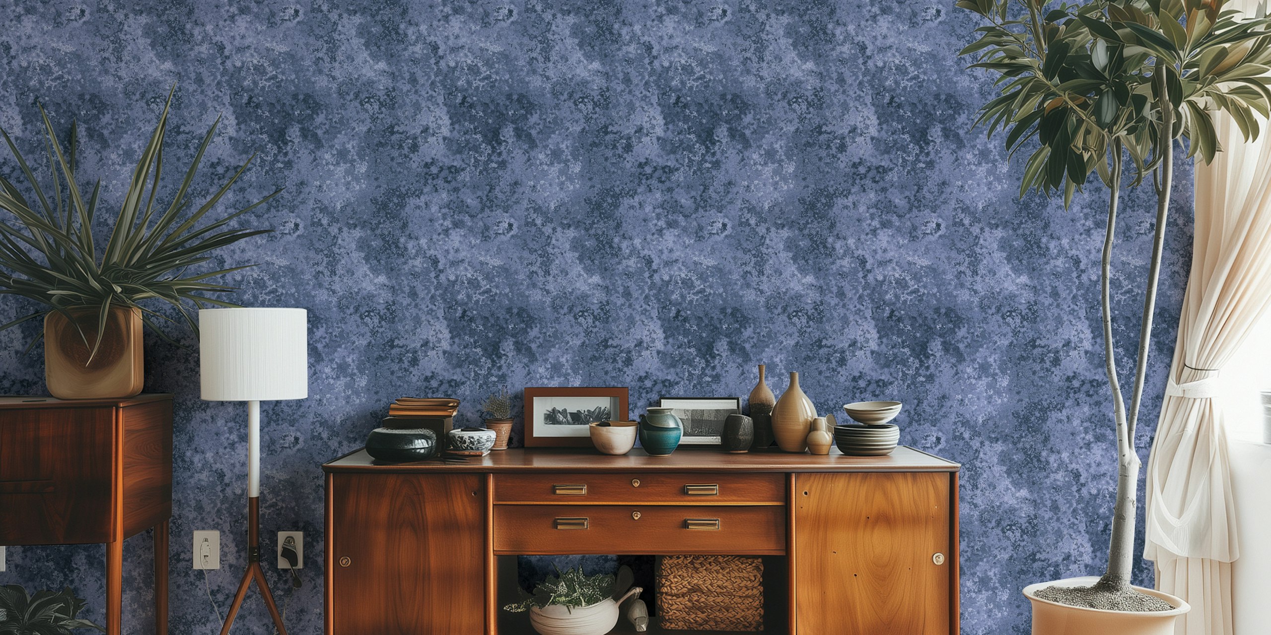 Subtle moss texture navy blue wallpaper in a room