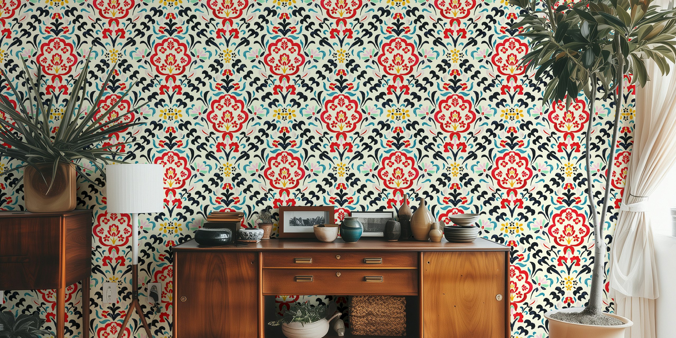 Multicolored floral patterns in red, blue, and gold on cream wallpaper