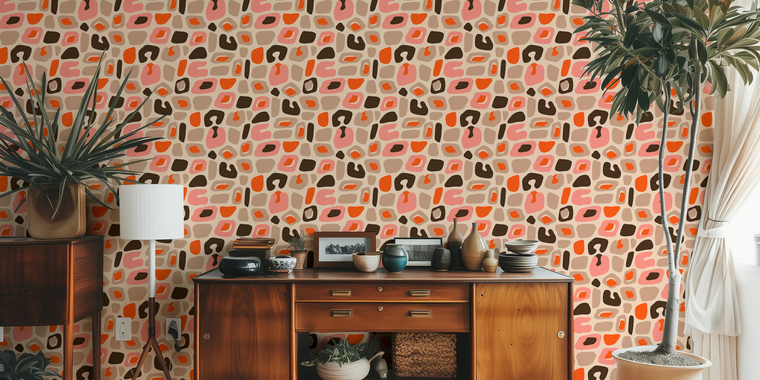 Colorful leopard print shapes in pink, orange, and brown wallpaper