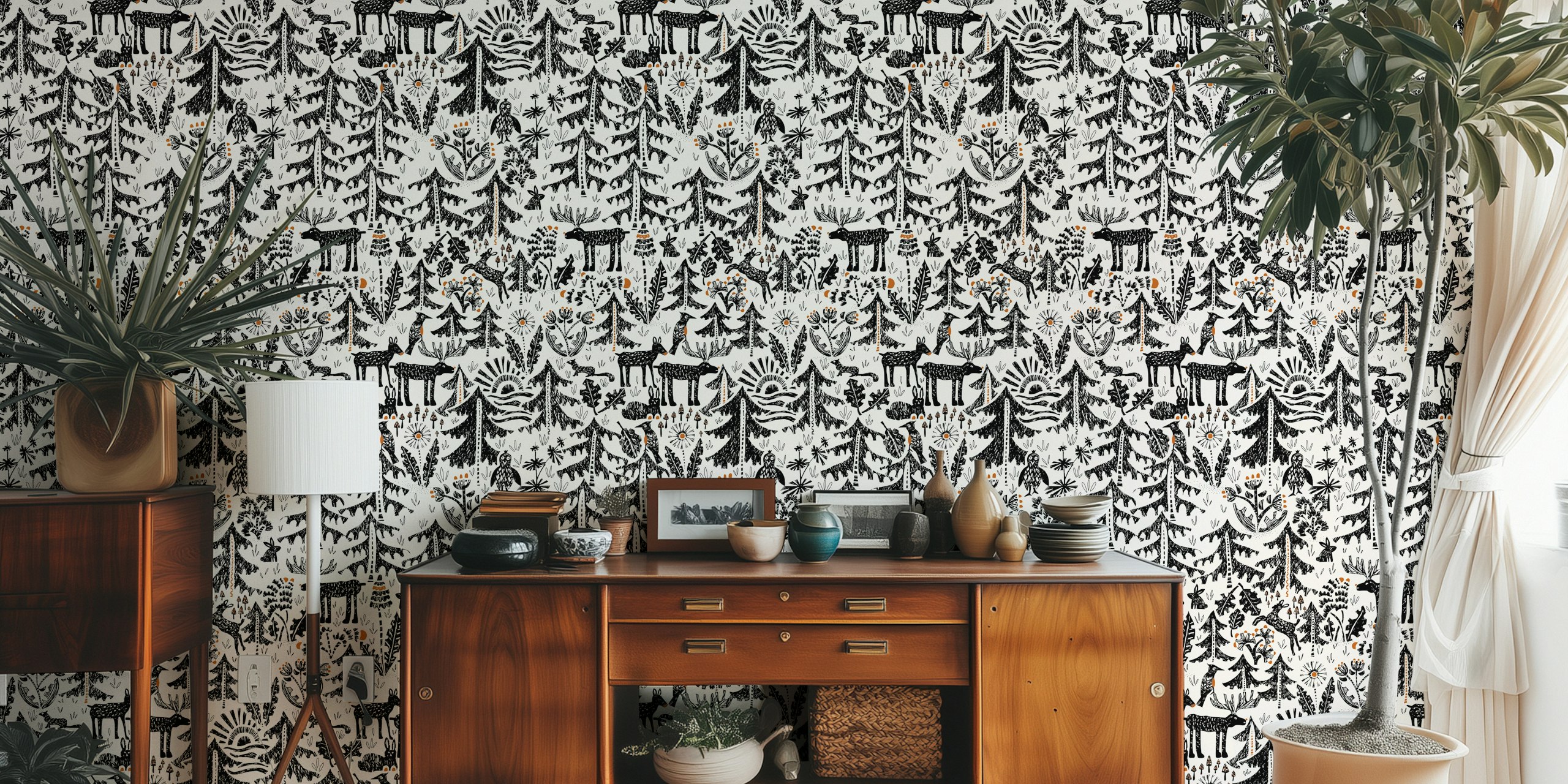 Nature-themed wallpaper featuring black trees, animals, and flowers with orange accents