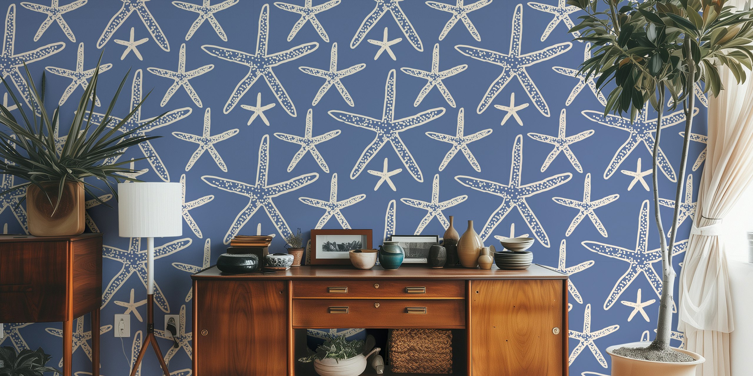 Blue starfish pattern against a navy background wallpaper