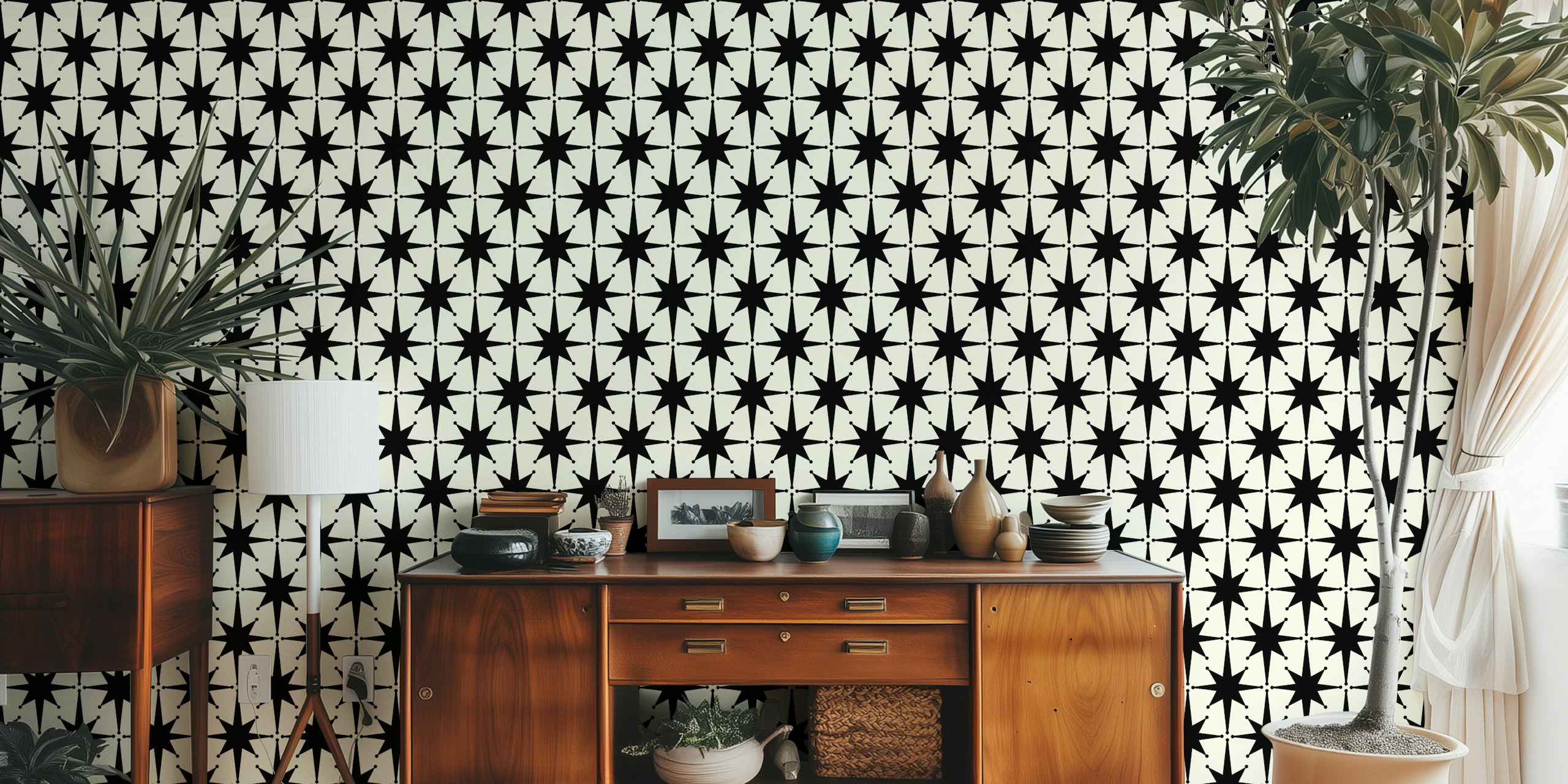 Black starburst shapes on cream background wallpaper