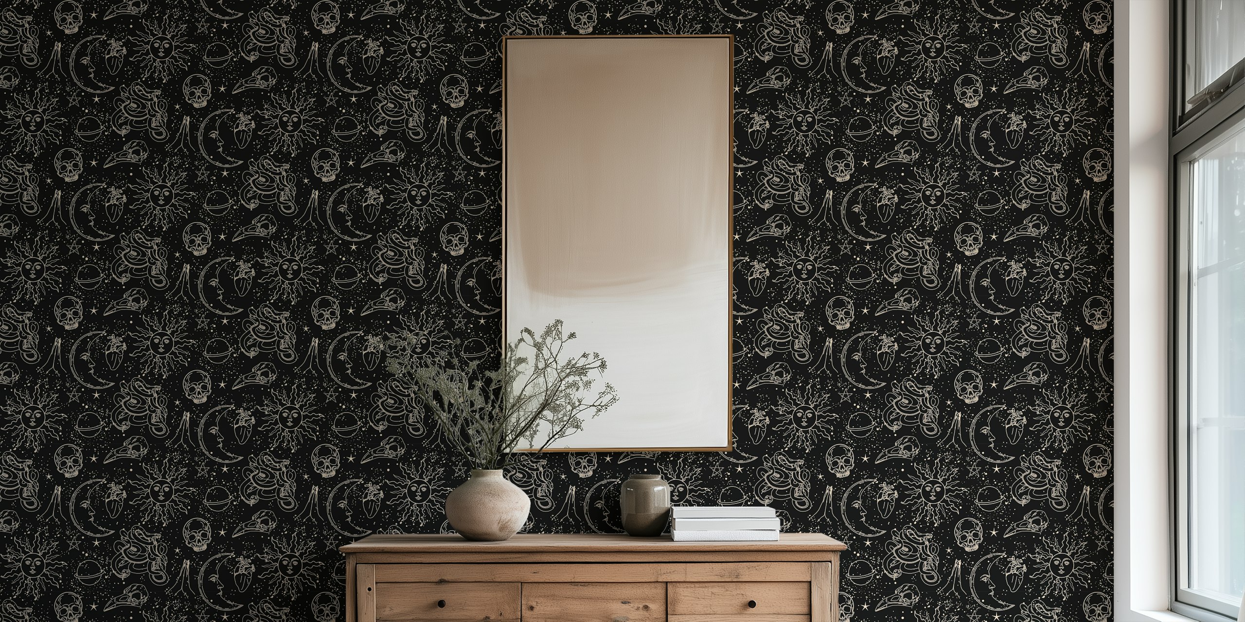 Celestial sun, moon, and star patterns in black and gold wallpaper