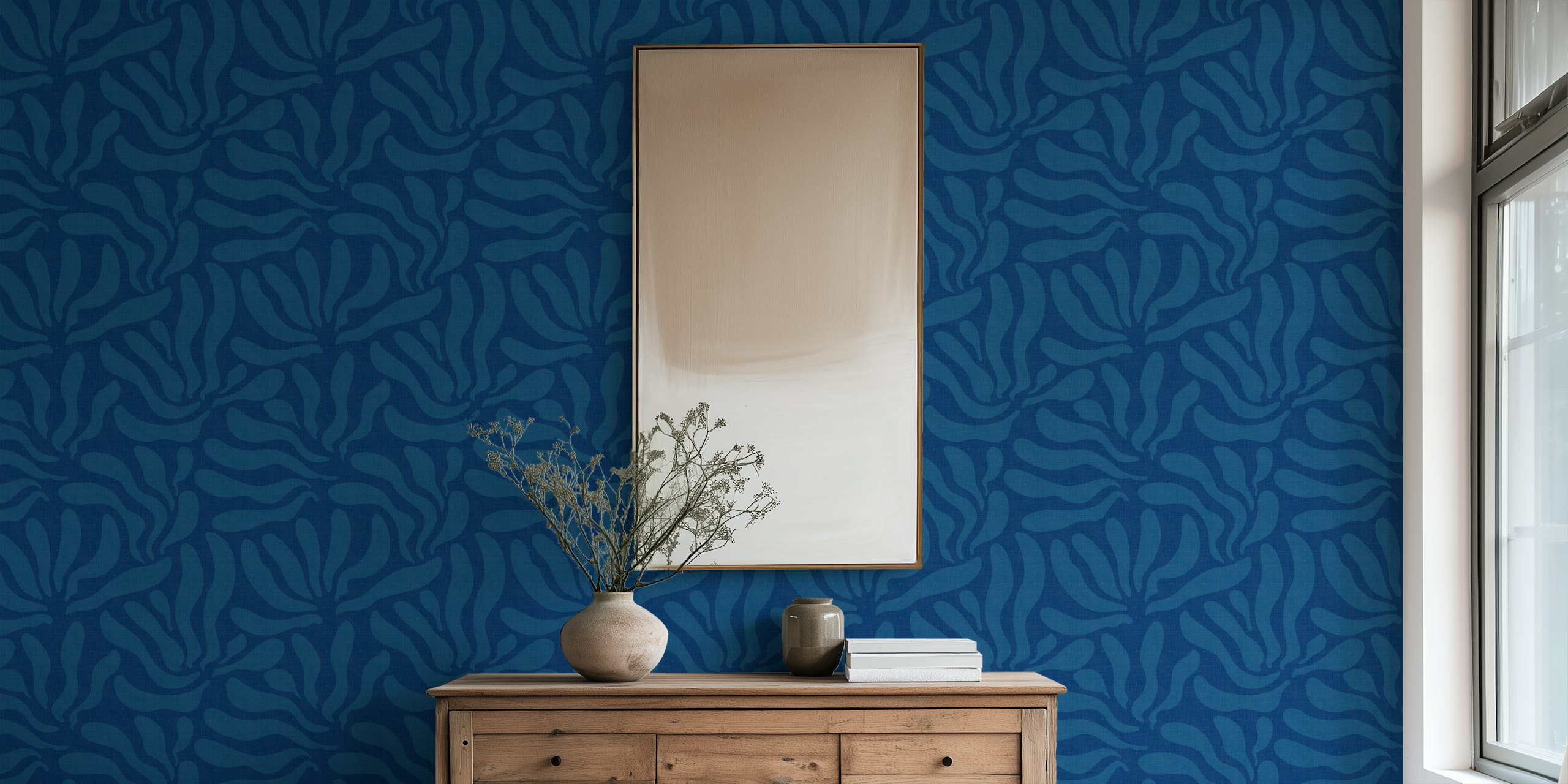 Ocean blue flowing leaves wallpaper in a room