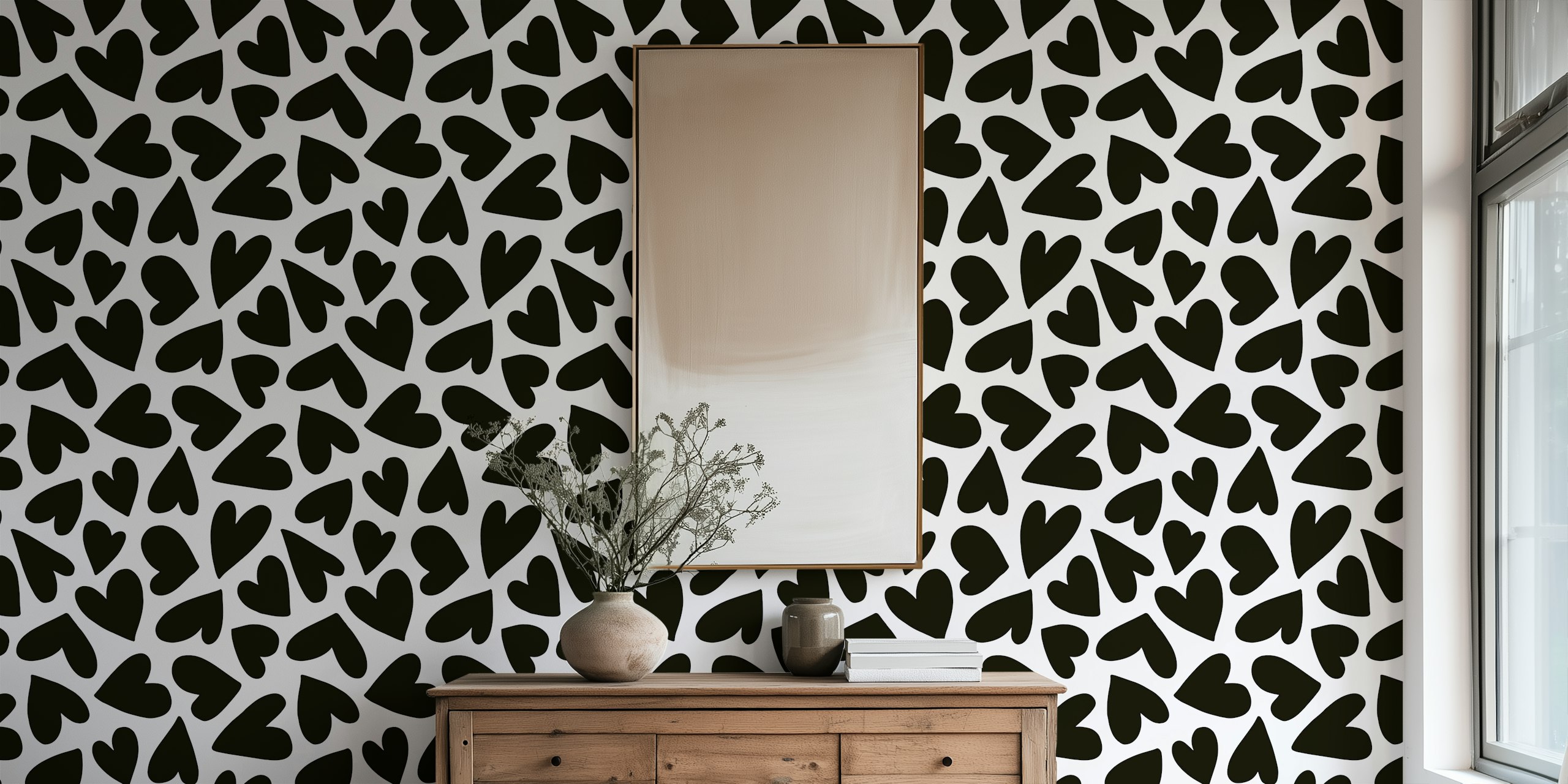 Playful hearts black and white wallpaper in a room