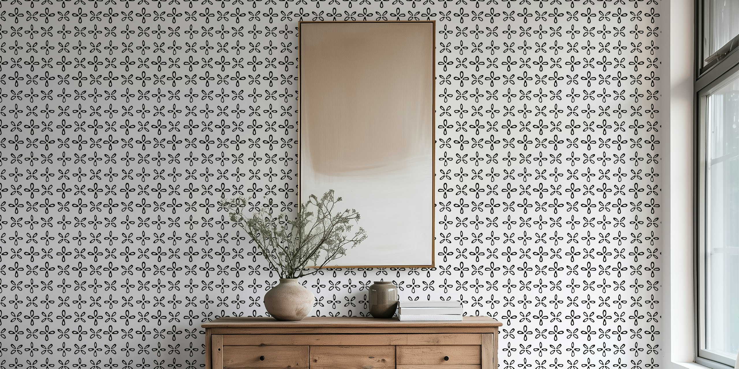 Black and white playful geo petal wallpaper in a room