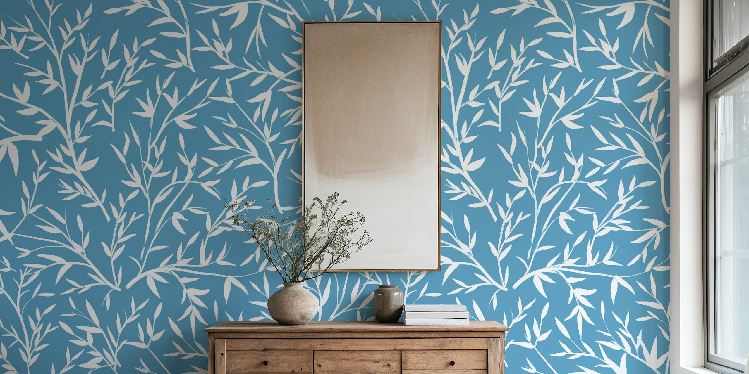 Papier peint bleu clair avec un motif de branches blanches couvertes de givre
