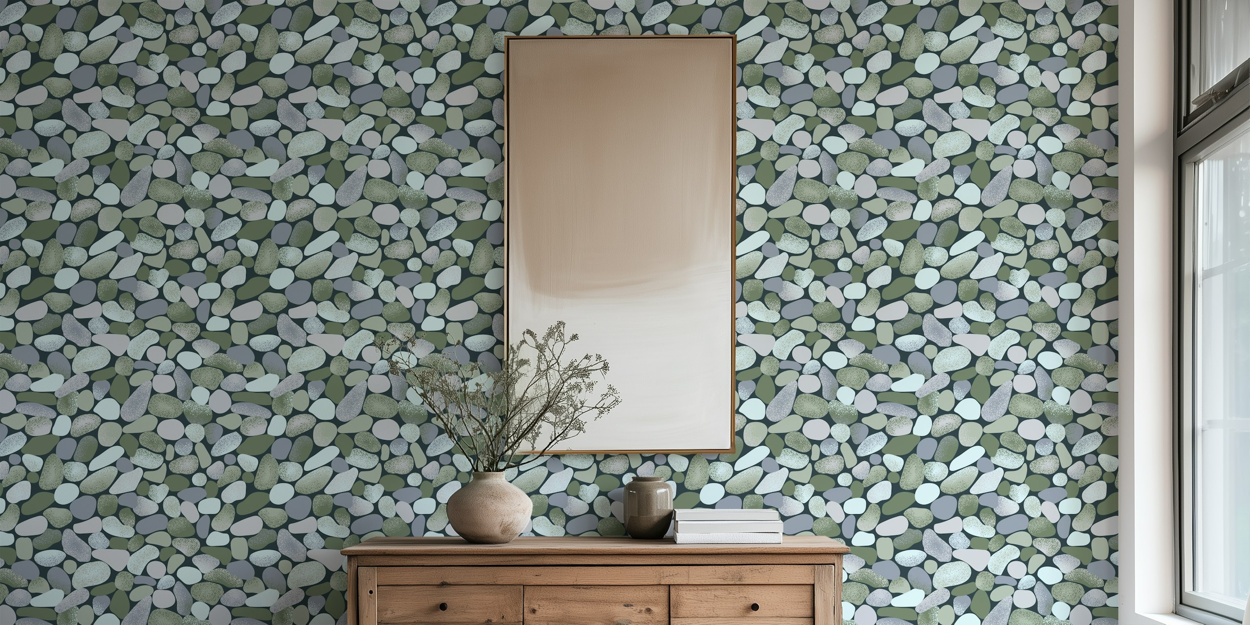 Une gamme apaisante de galets arrondis dans des teintes douces de gris, de bleu et de vert sur une fresque murale.