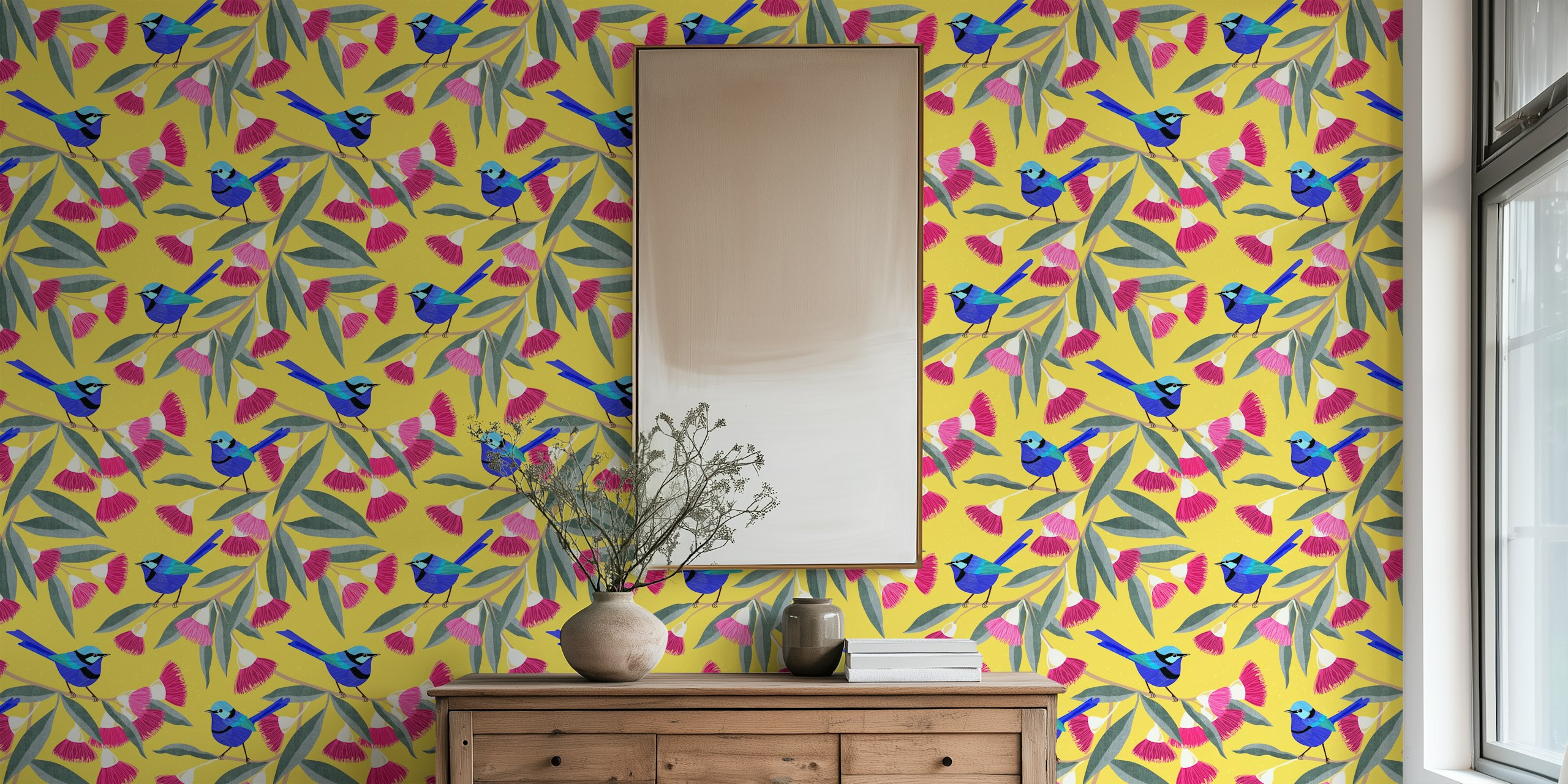 Colorful wallpaper featuring blue fairy wrens and pink eucalyptus flowers on a yellow background