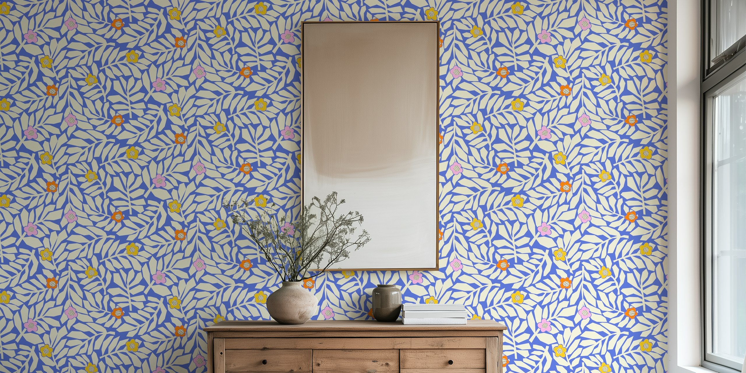 Leaves and pastel blossoms pattern on blue wallpaper