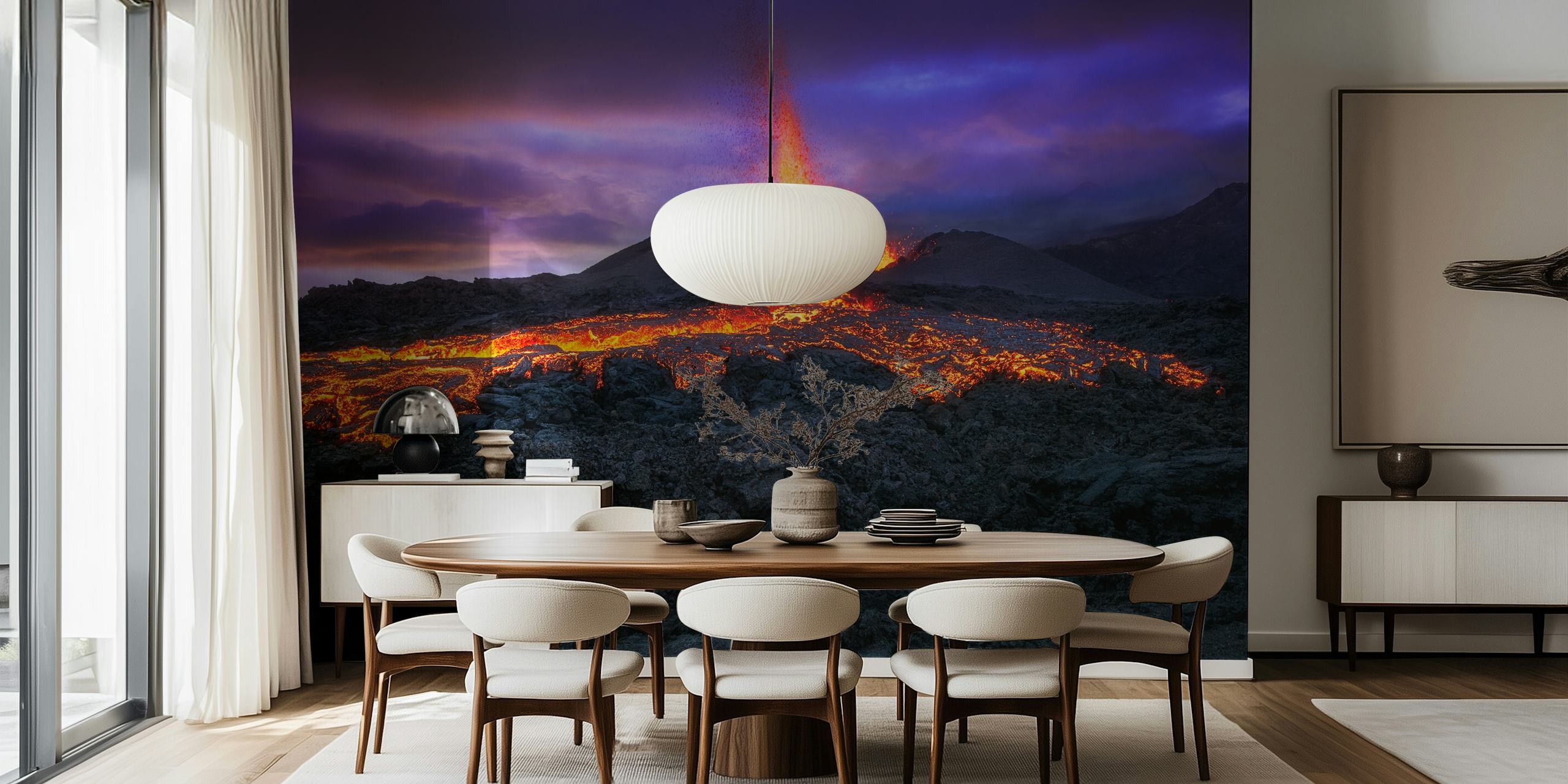 Volcanic eruption with glowing lava and dark rocky landscape wallpaper