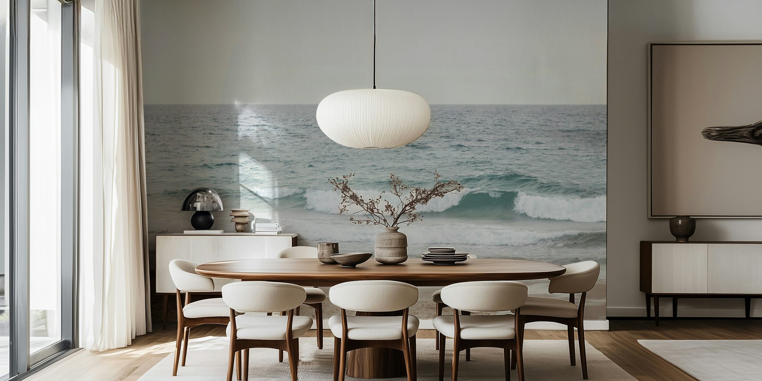 Ocean waves on a beach with soft beige sand and blue water wallpaper