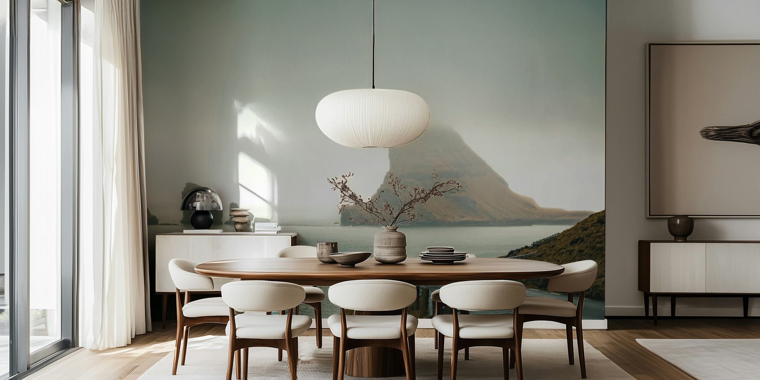 Coastal landscape with misty hills and rocky formations wallpaper