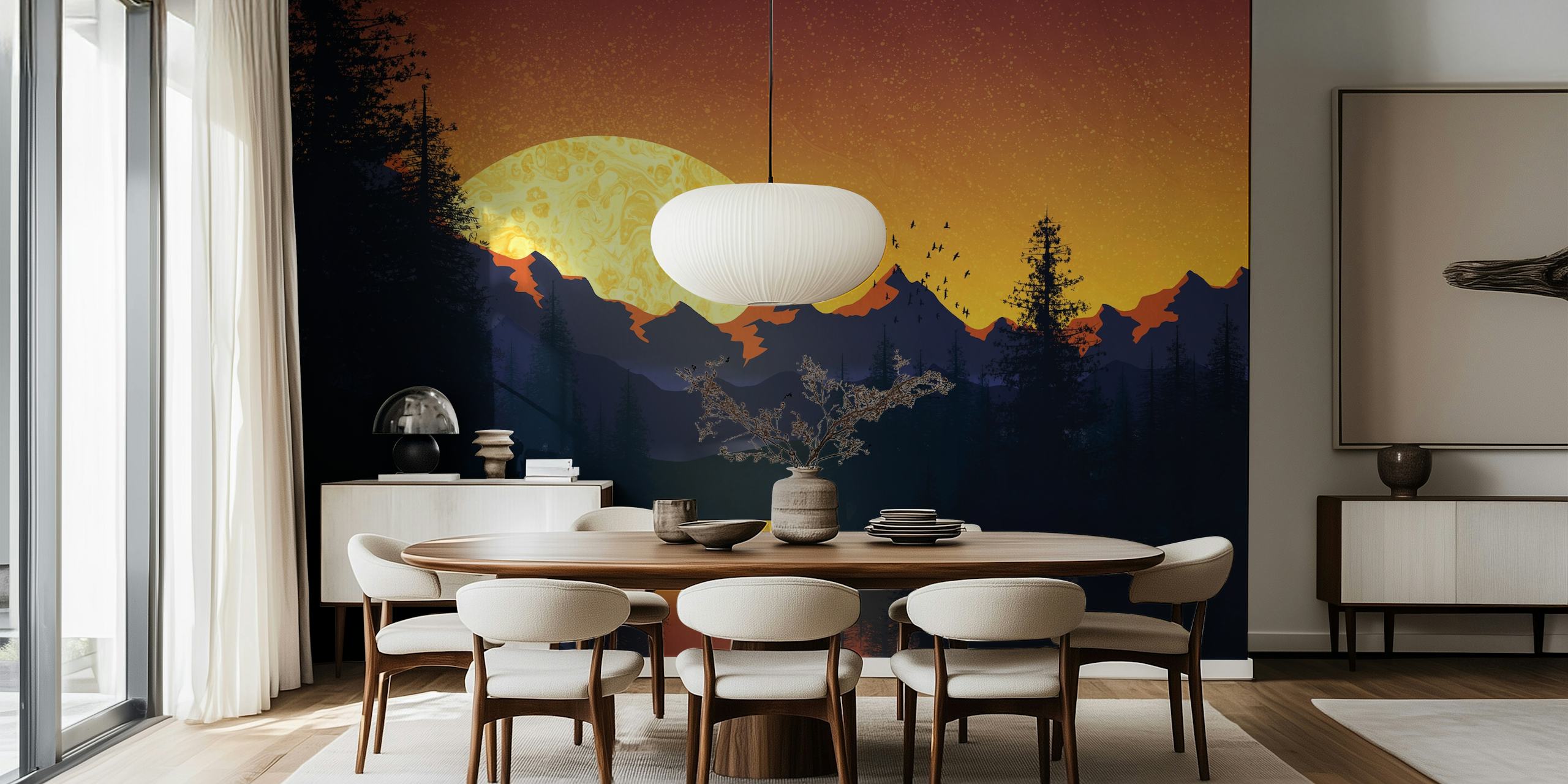 Silhouette of pine trees and mountains against a vibrant sunset wallpaper