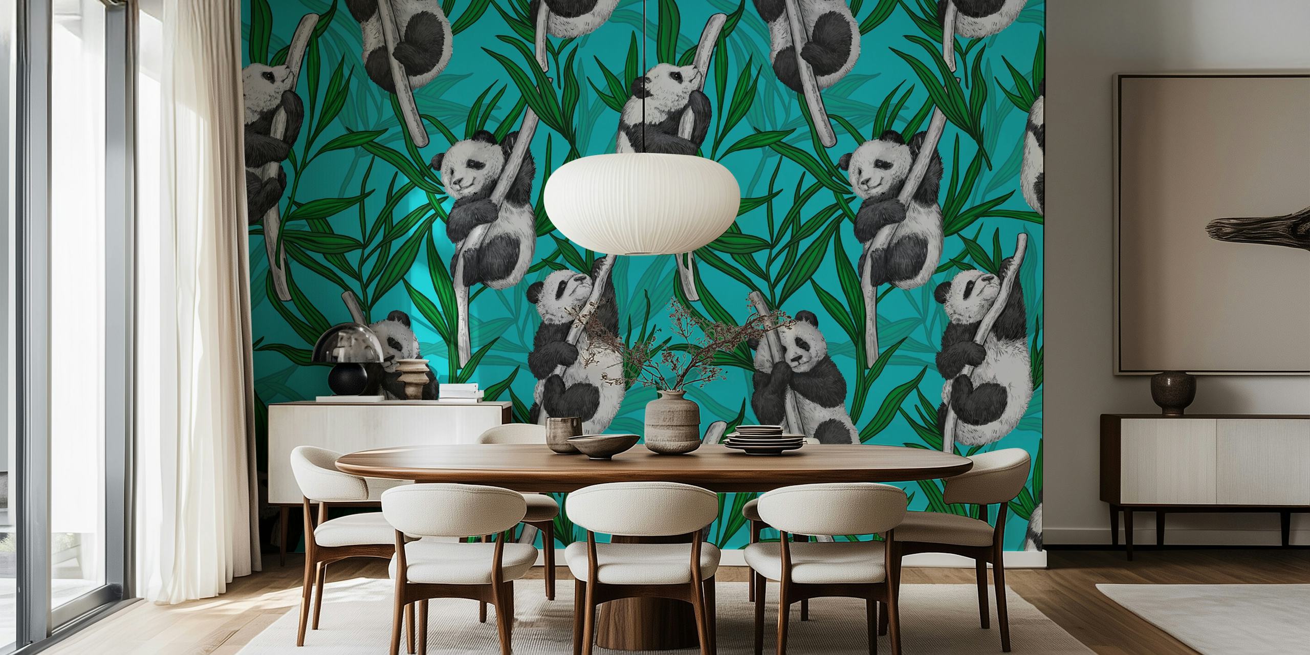 Panda cubs playing in greenery on turquoise wall mural