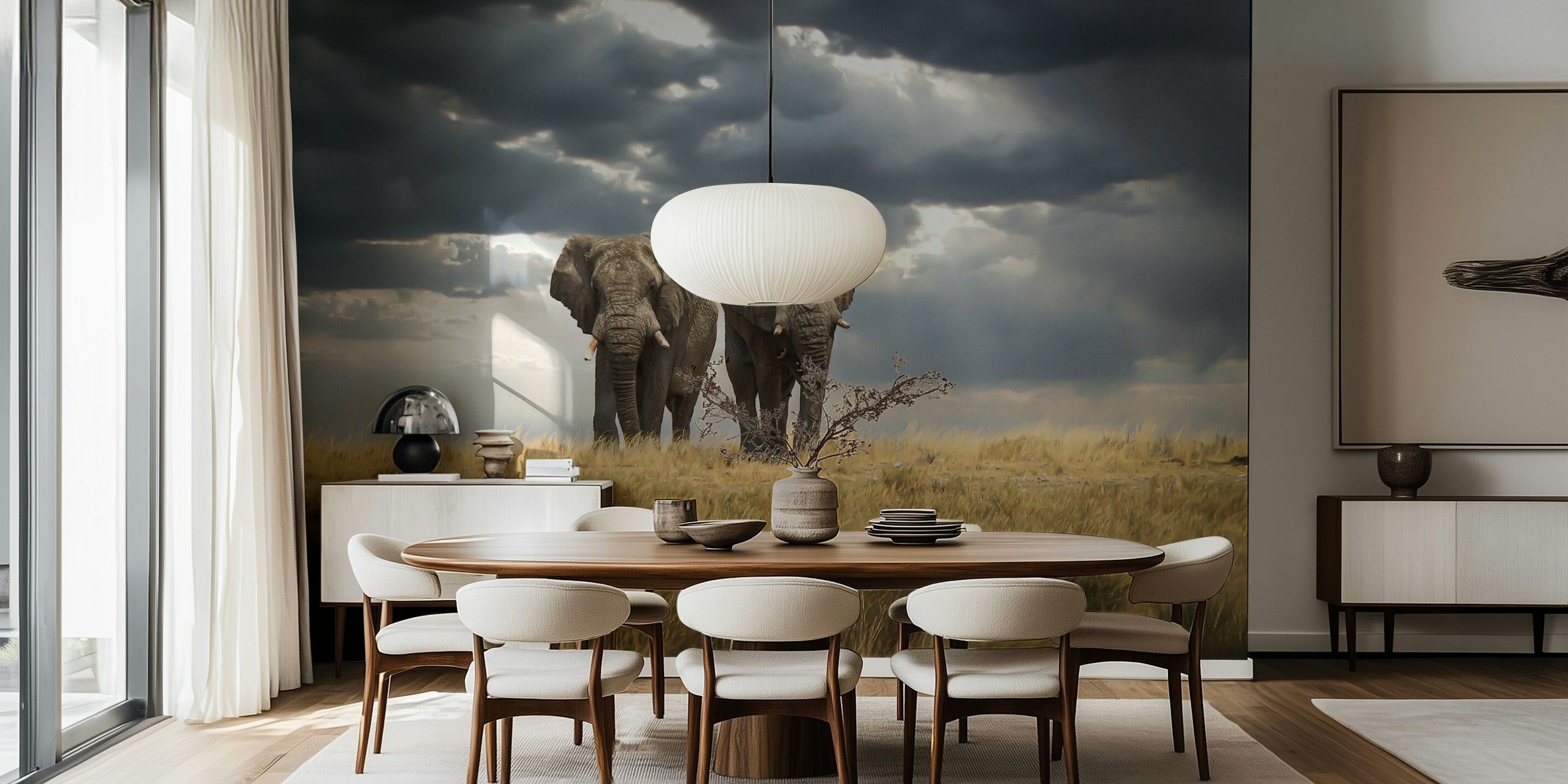 Elephants standing in a grassland under cloudy sky wallpaper