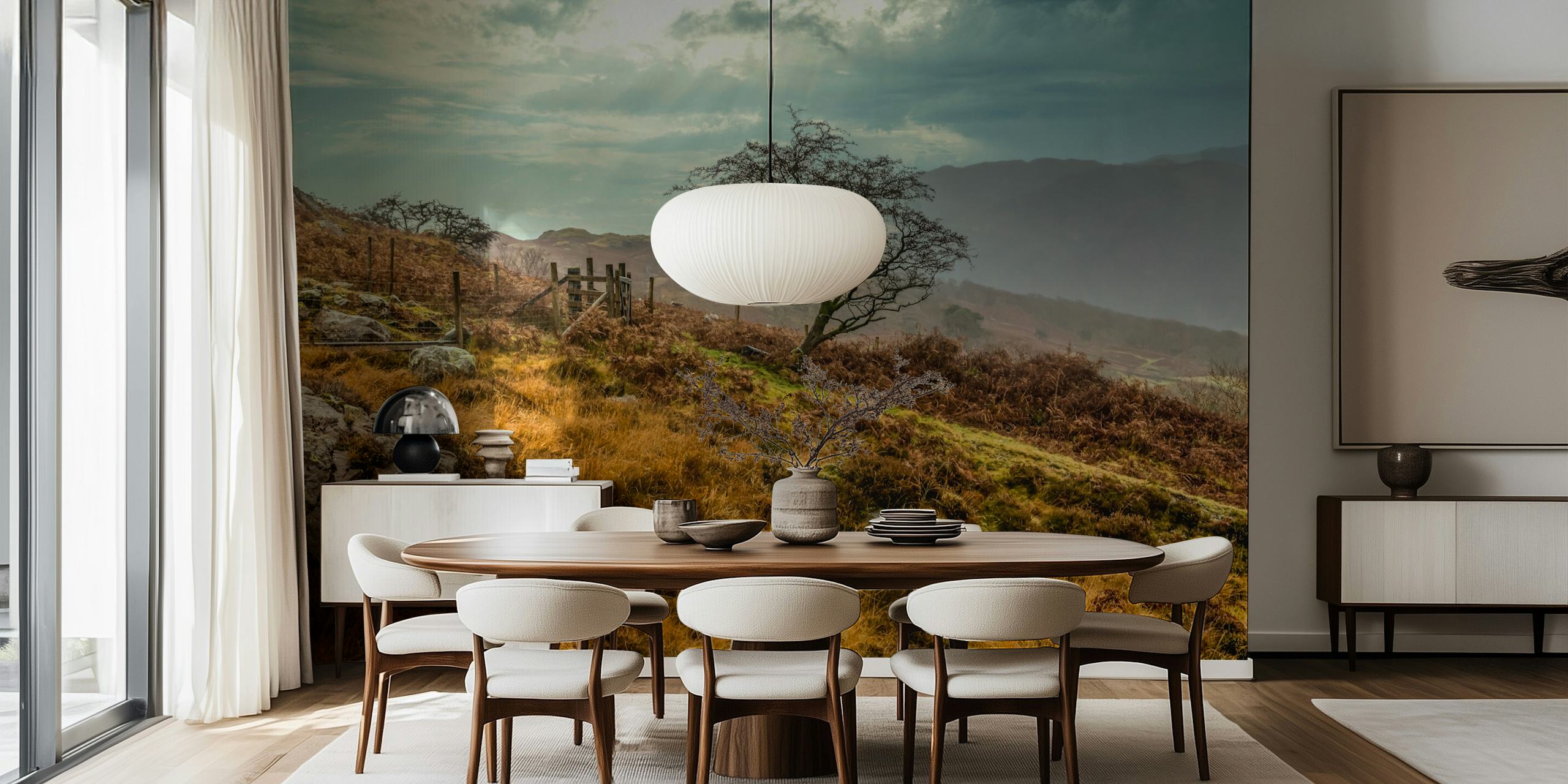 Lush landscape featuring a tree, rocky terrain, and cloudy skies wallpaper