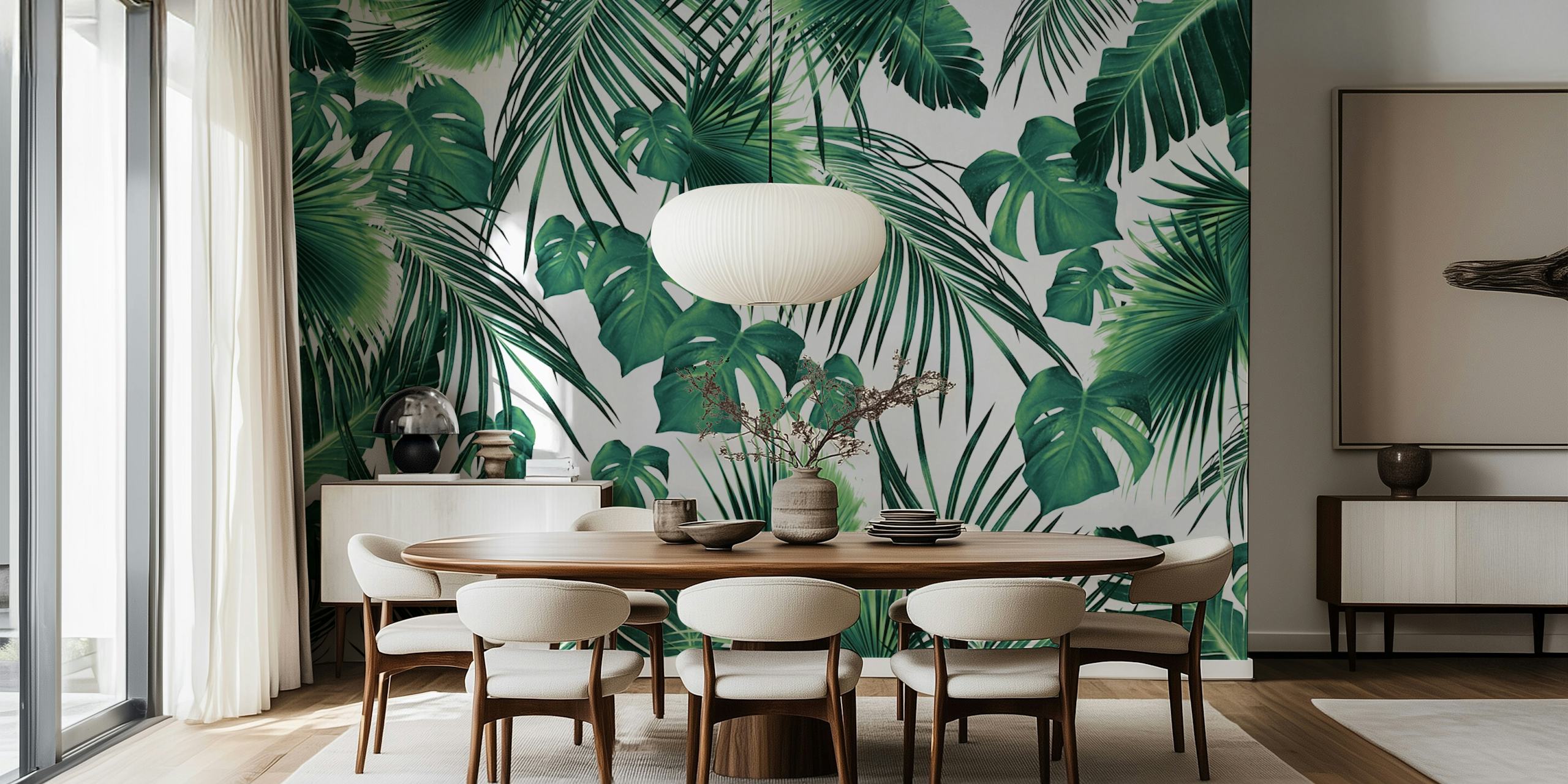 Tropical green monstera leaves on white background wallpaper