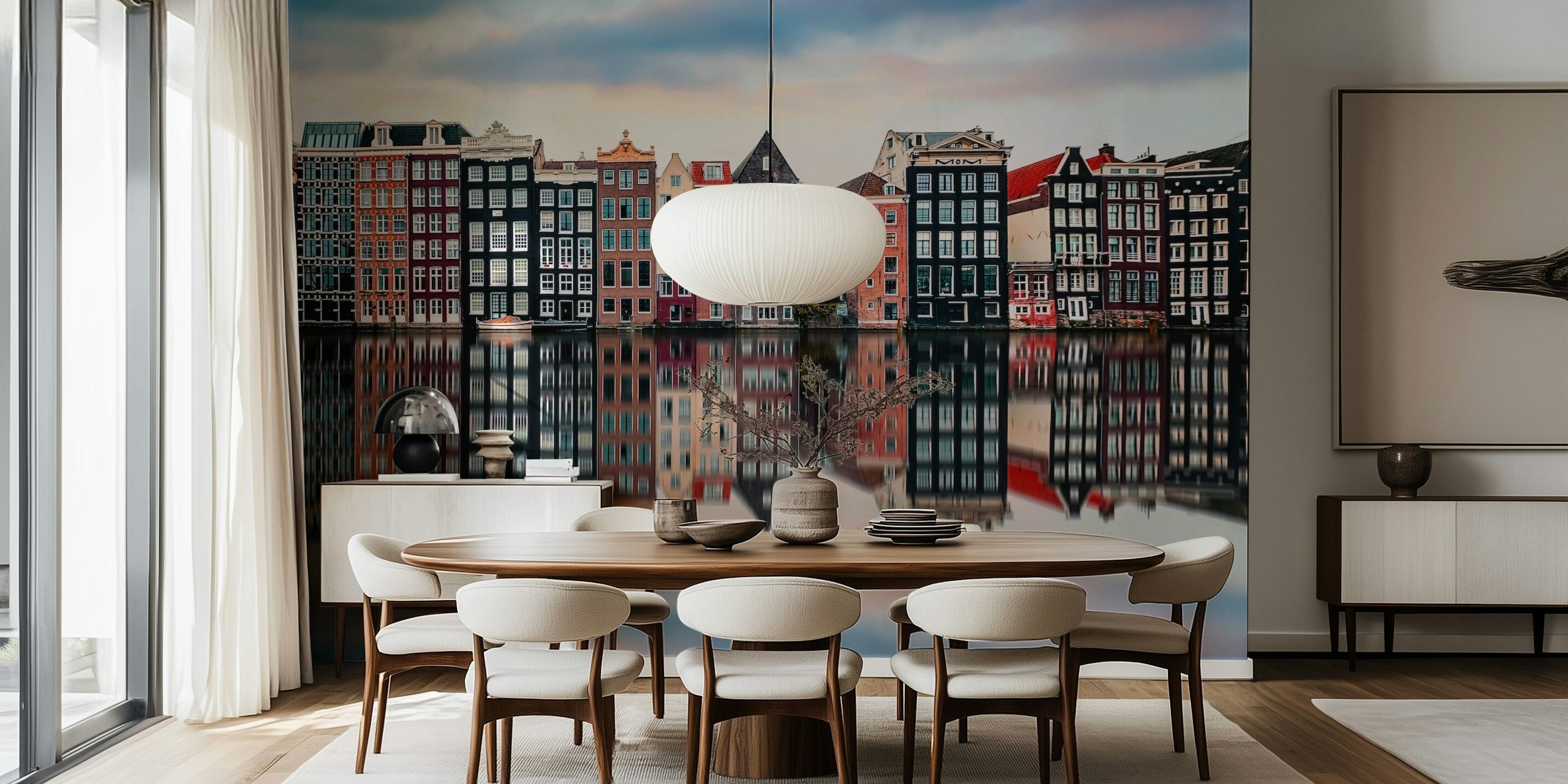 Colorful Amsterdam canal houses reflecting in water wallpaper