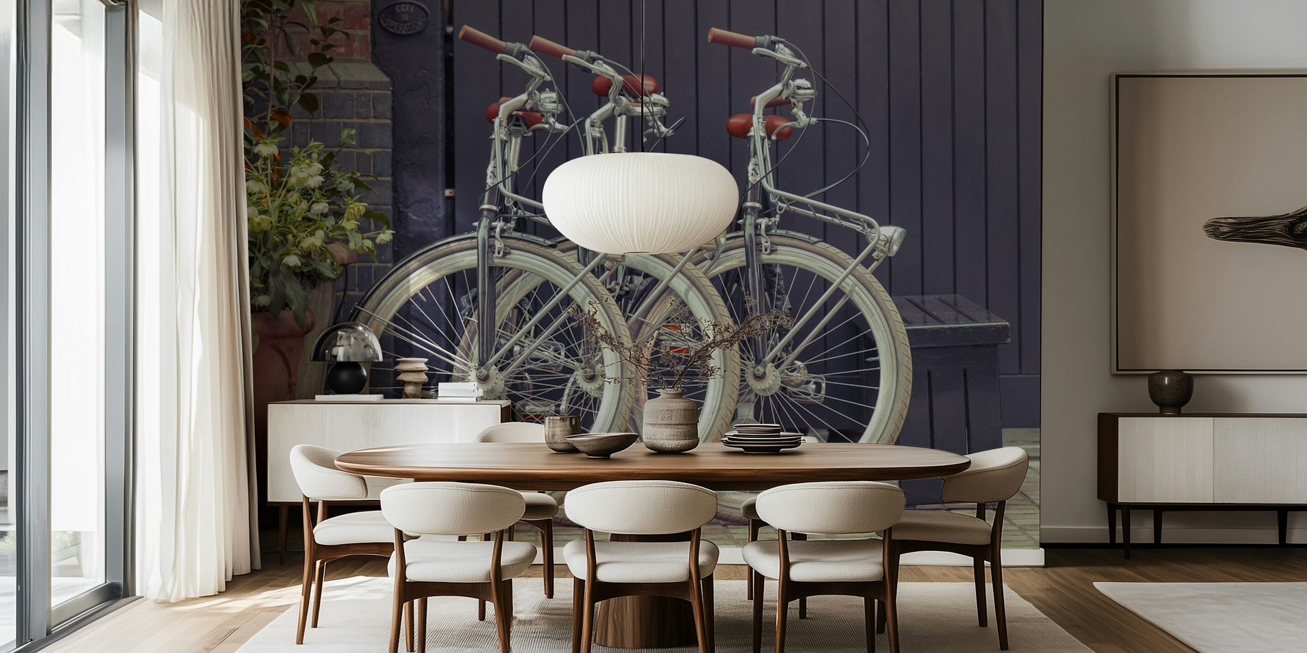 Vintage bicycles parked on a cobblestone street with flowers wallpaper