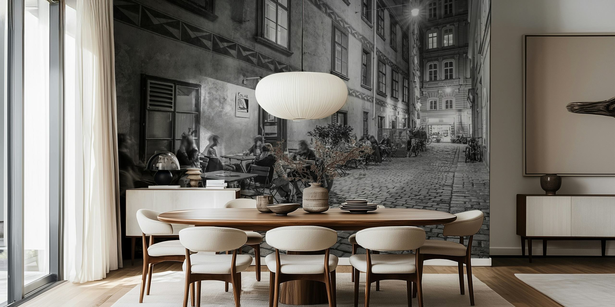 Black and white street cafe scene with tables and patrons wallpaper